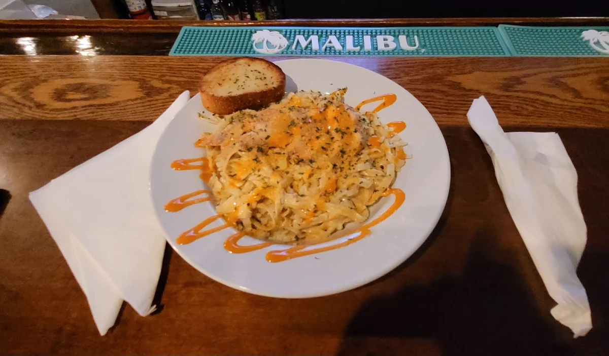 Grilled Chicken Alfredo Pasta with Buffalo Sauce Drizzle