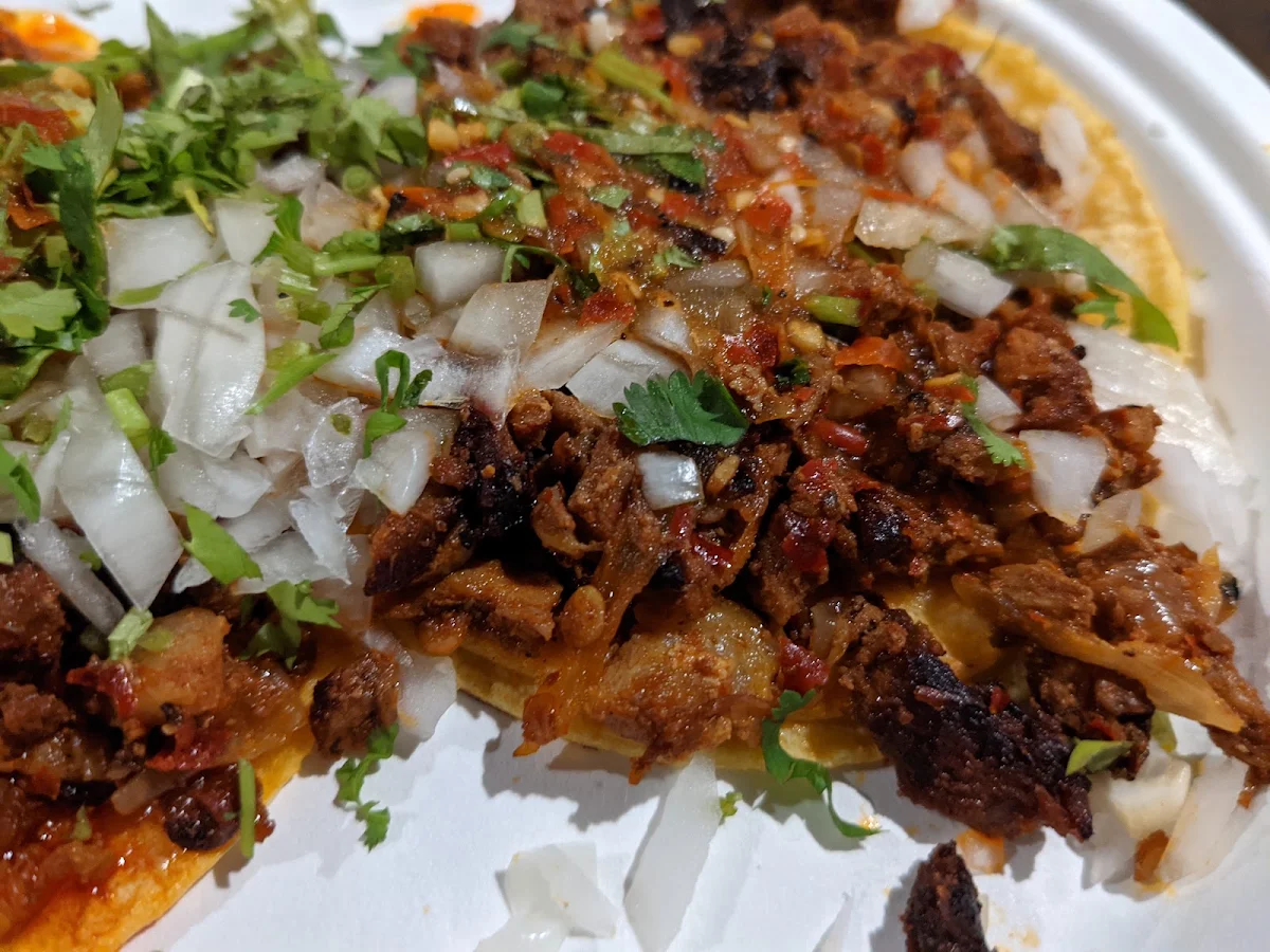 2 Carne Asada and 2 Carnitas Tacos