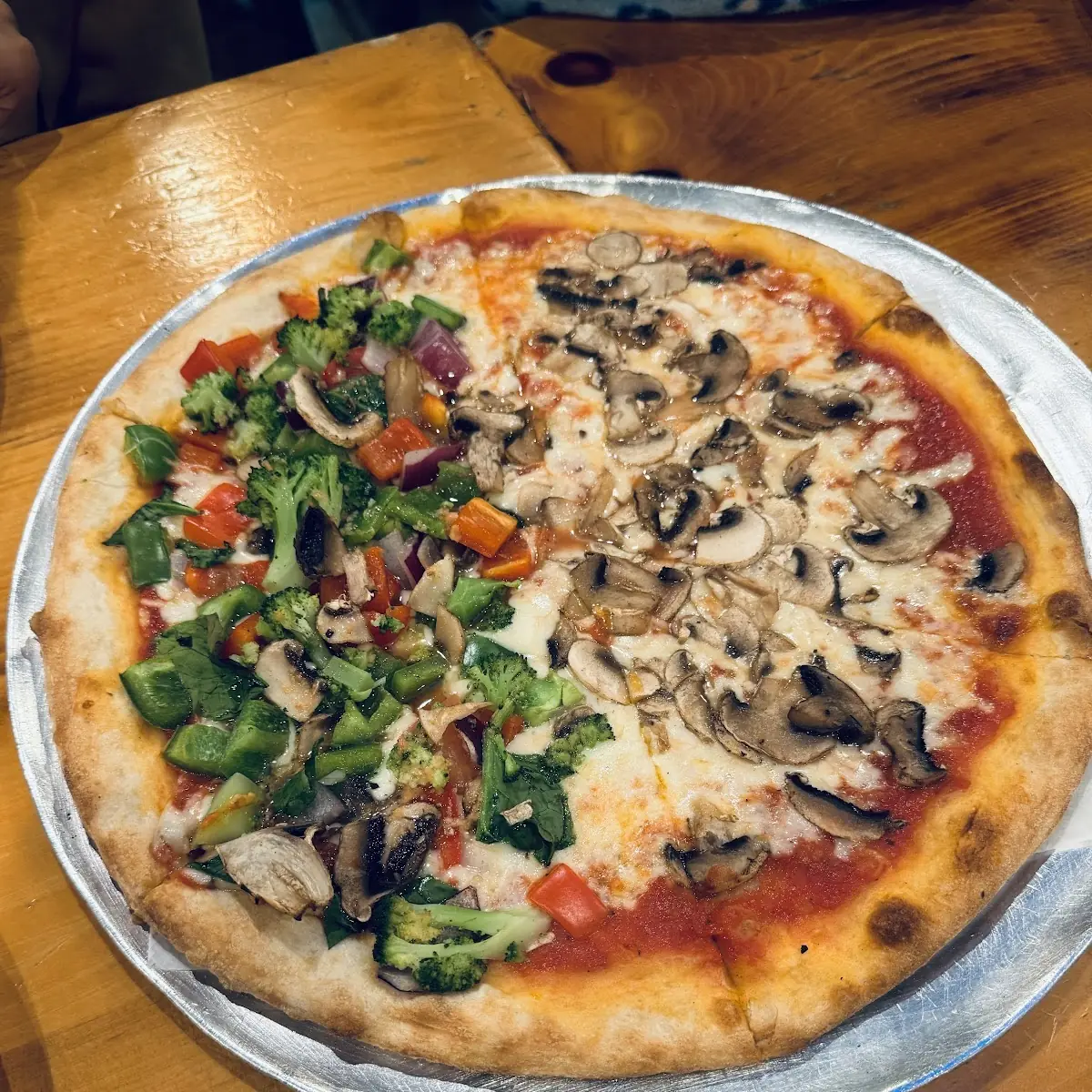 Half Vegi and Half Mushroom Pizza