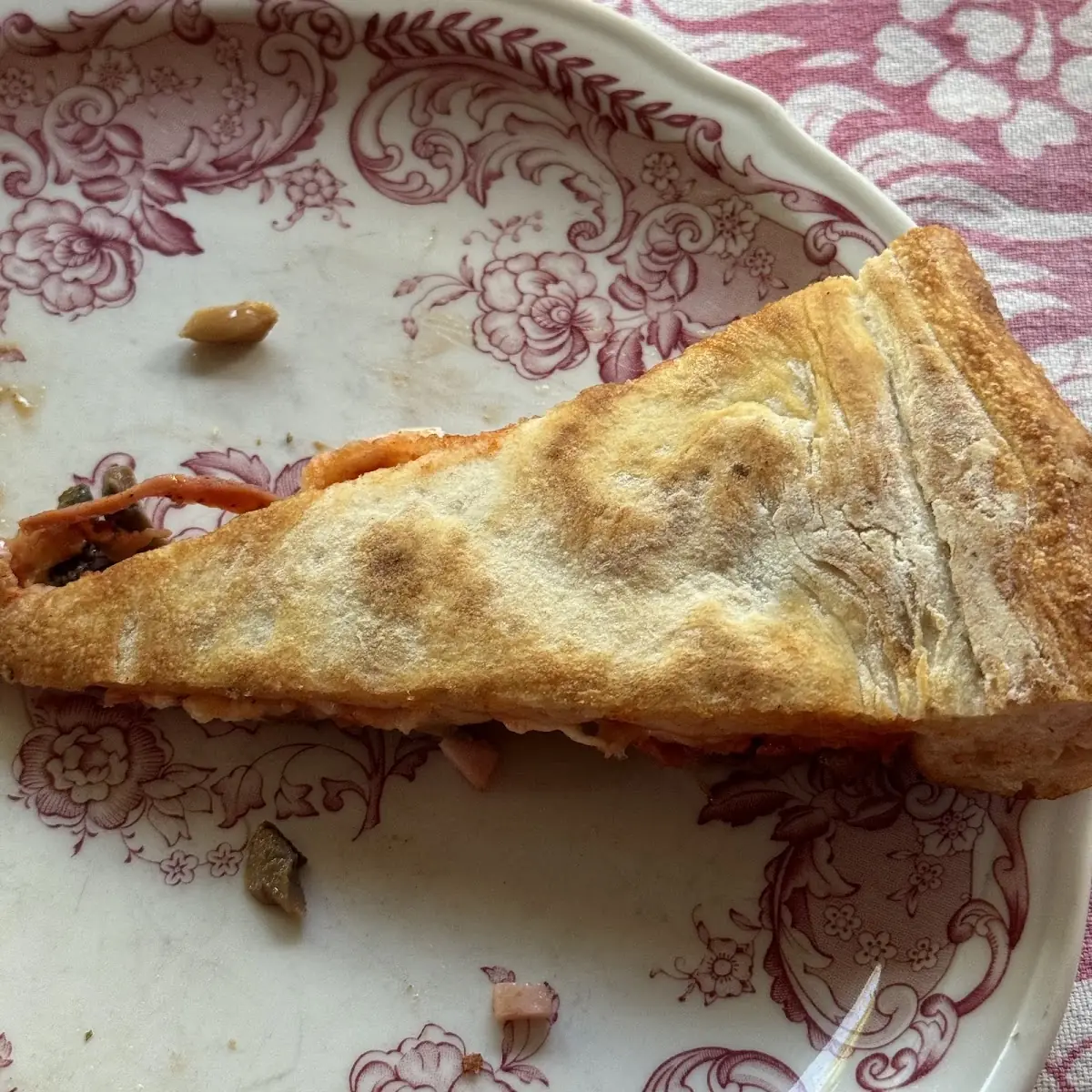 Undercarriage of Ham Mushroom and Pepperoni Pizza
