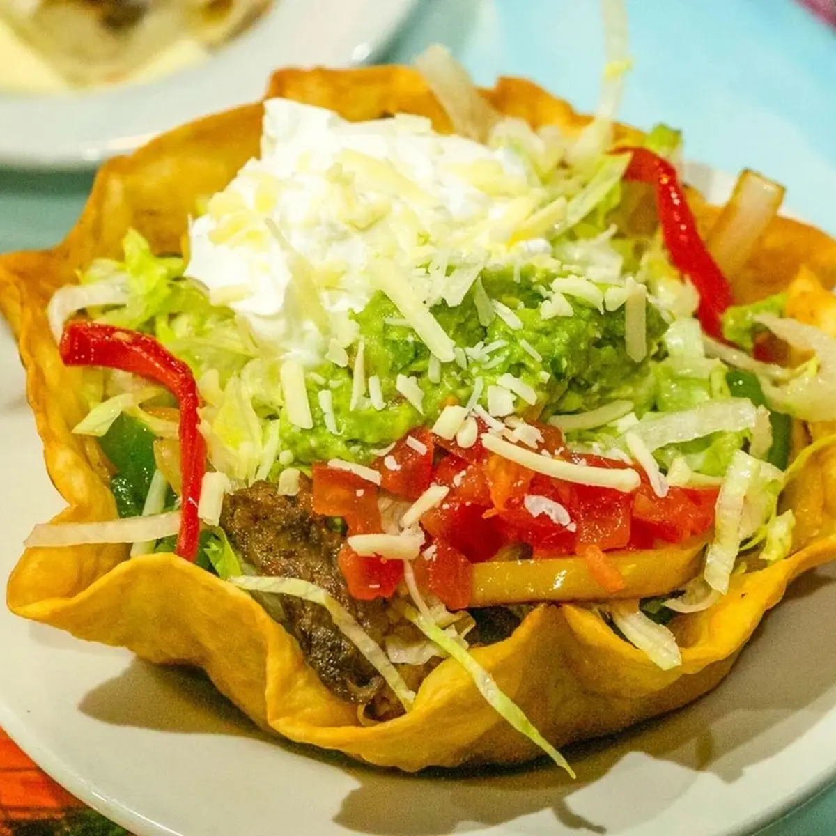 6.11 Beef or Chicken tostada