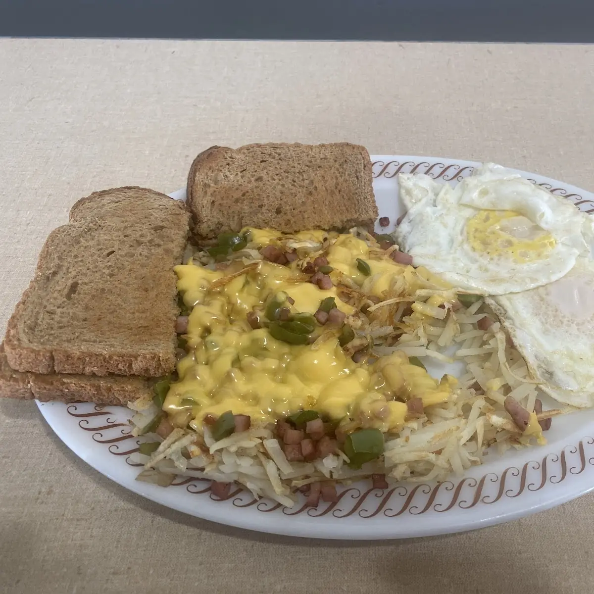 Two Eggs Toast and Hash Browns