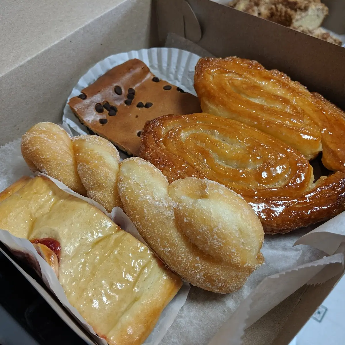 Assorted Desserts Strawberry Bar Sugar Twist Peanut Butter Bar and Elephant Ear