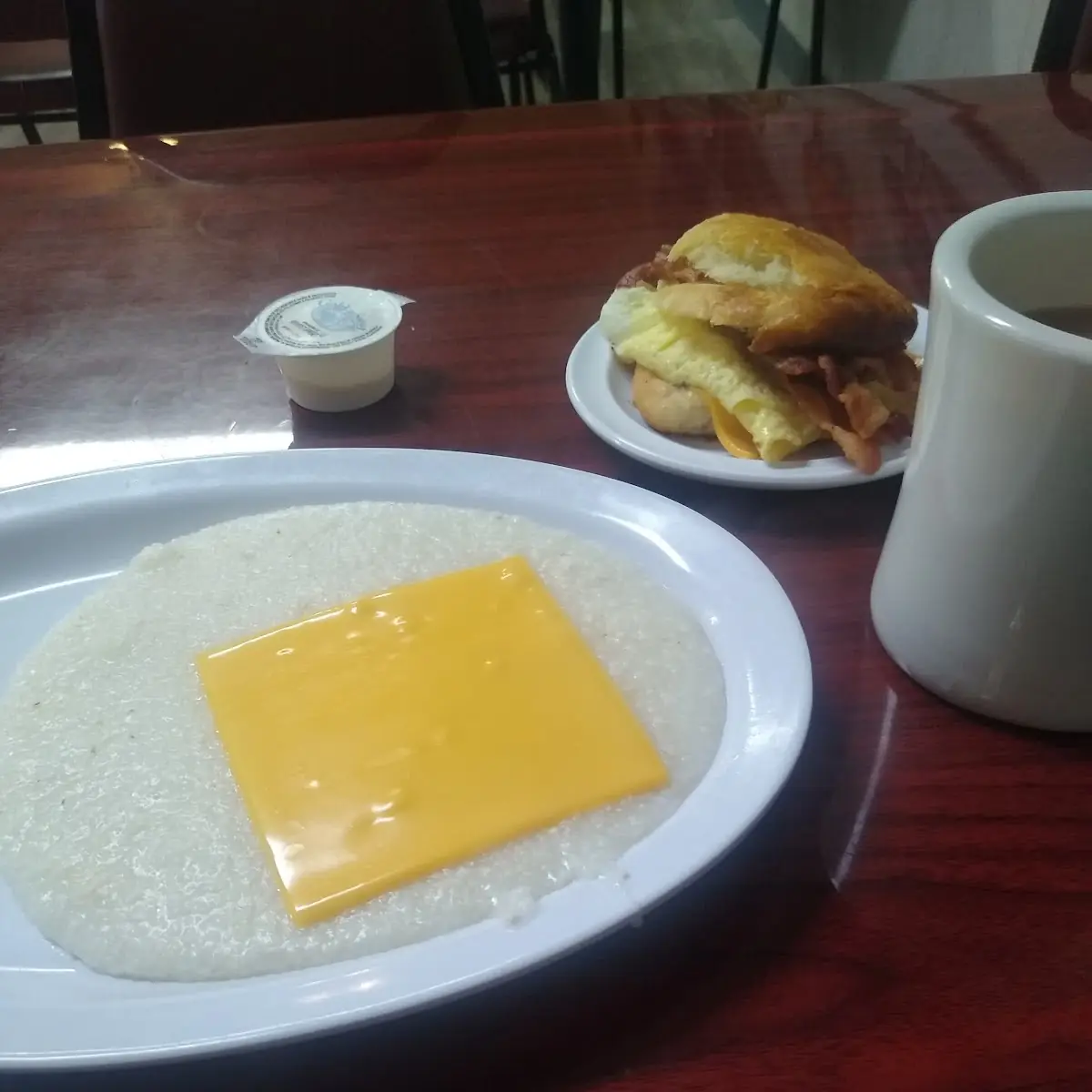 Bacon Egg and Cheese Biscuit with Cheese Grits