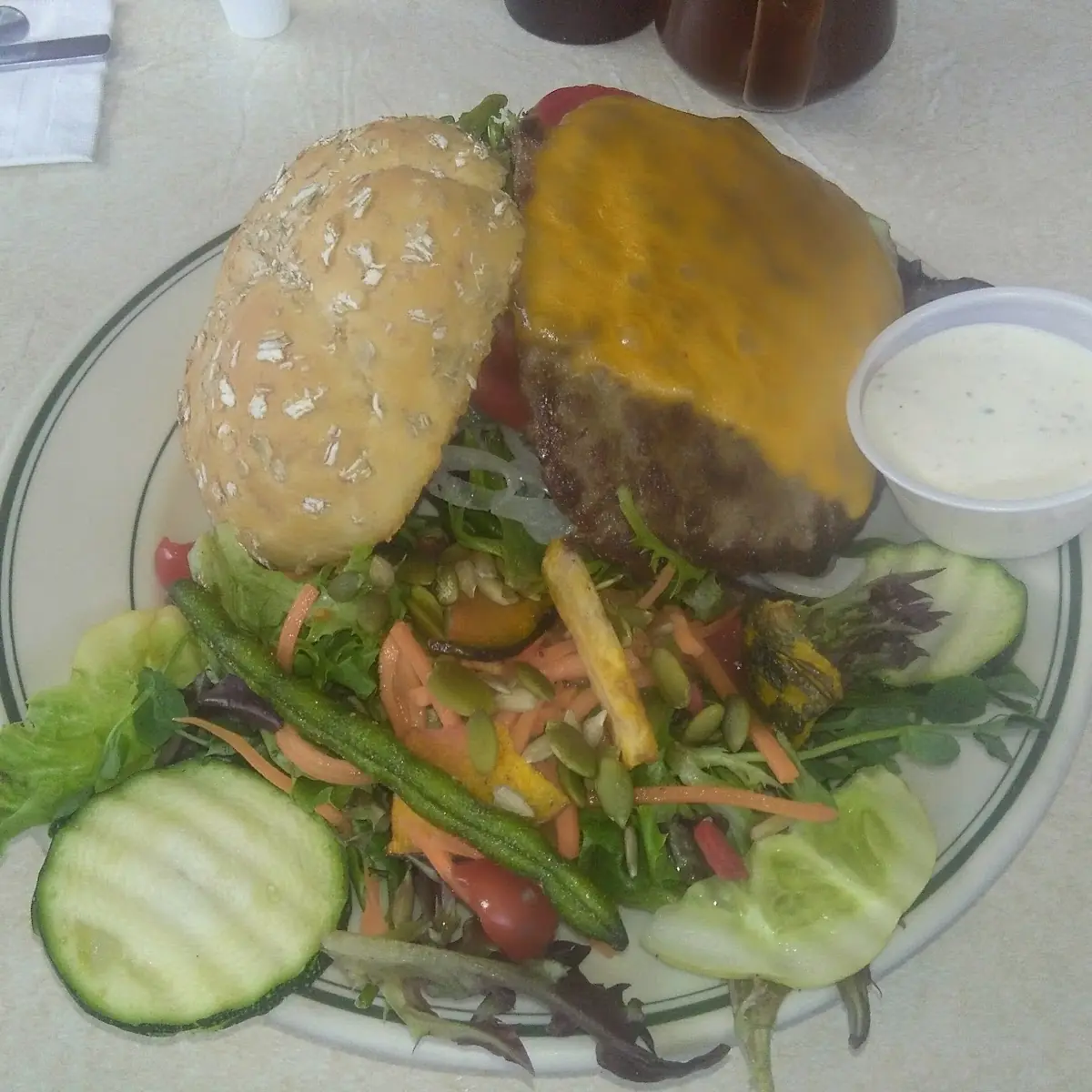 Cheeseburger with a Side Salad