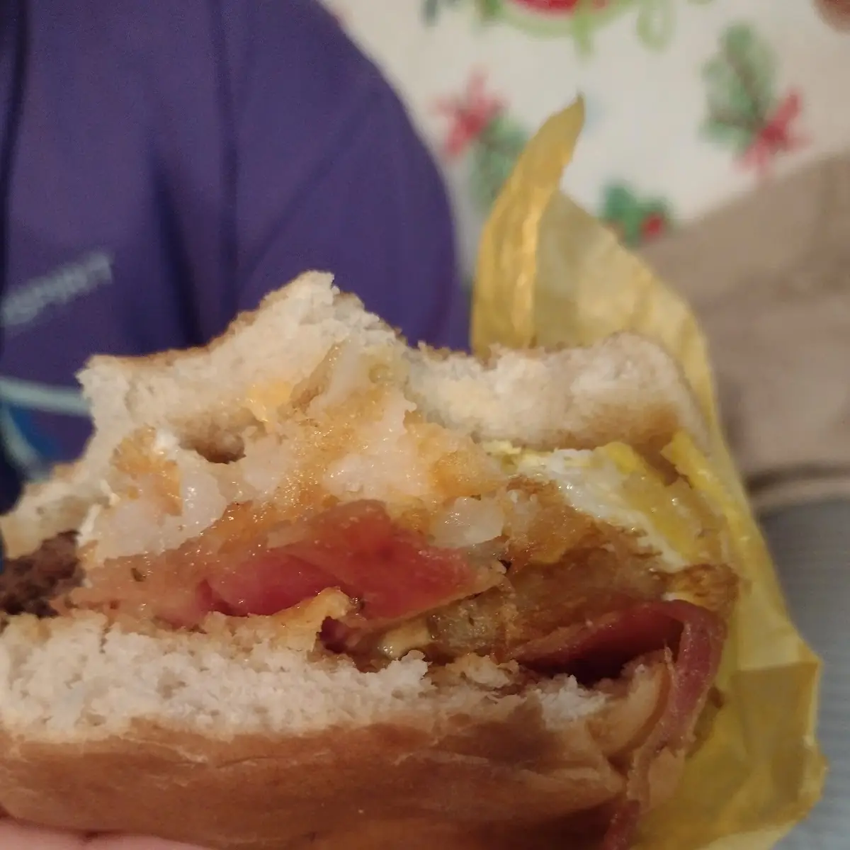 Breakfast Sandwich with Bacon Cheese Egg Hasbrown on It