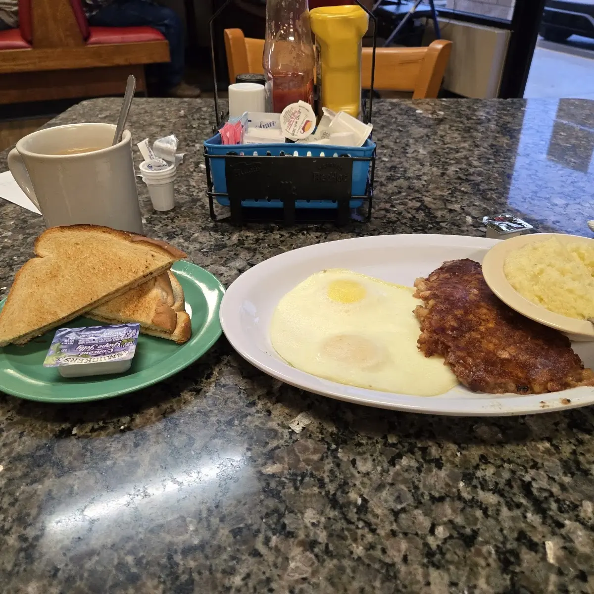 Corned Beef Hash Scrambled Eggs Grits and Toast