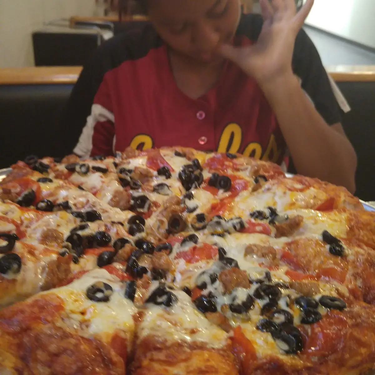 Pepperoni Sausage and Olive Pizza