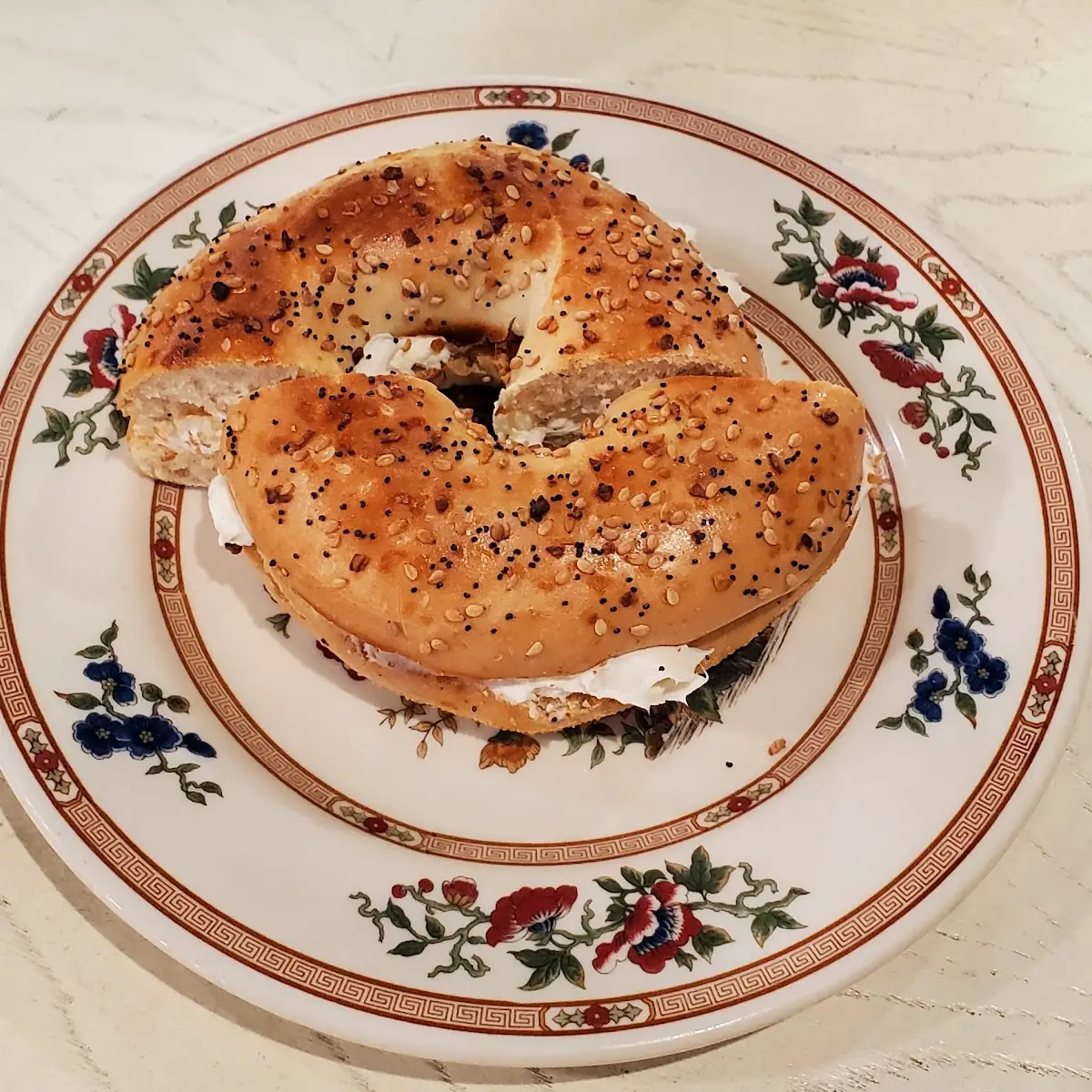 Smoked salmon bagel: smoked salmon, capers, cream cheese, onion and tomato on everything or plain bagel