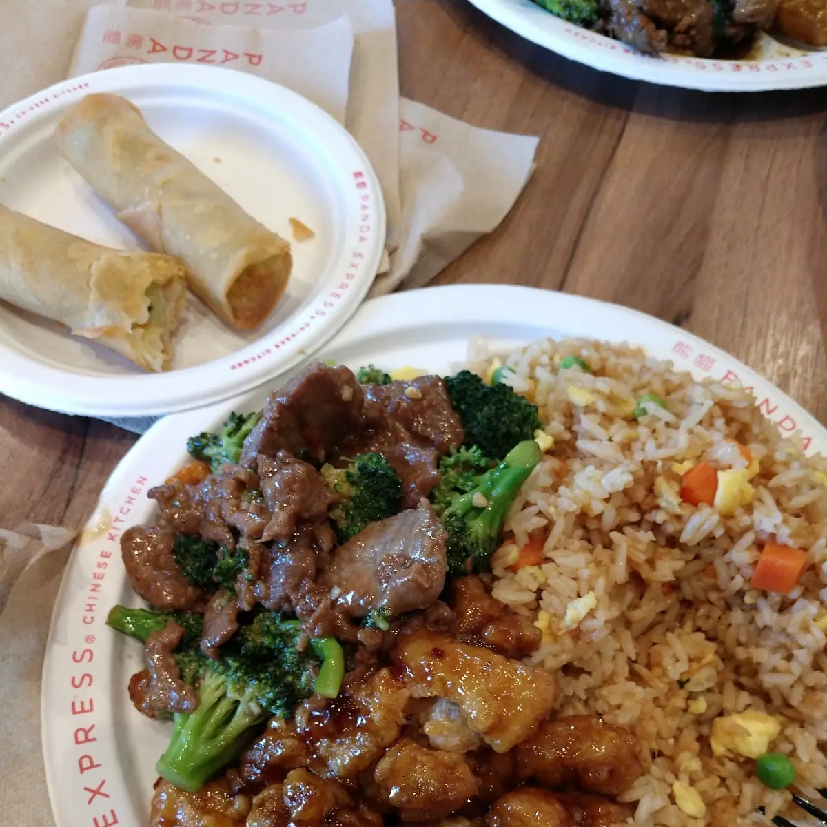 Orange Chicken Beef Broccoli Spring Rolls and Fried Rice