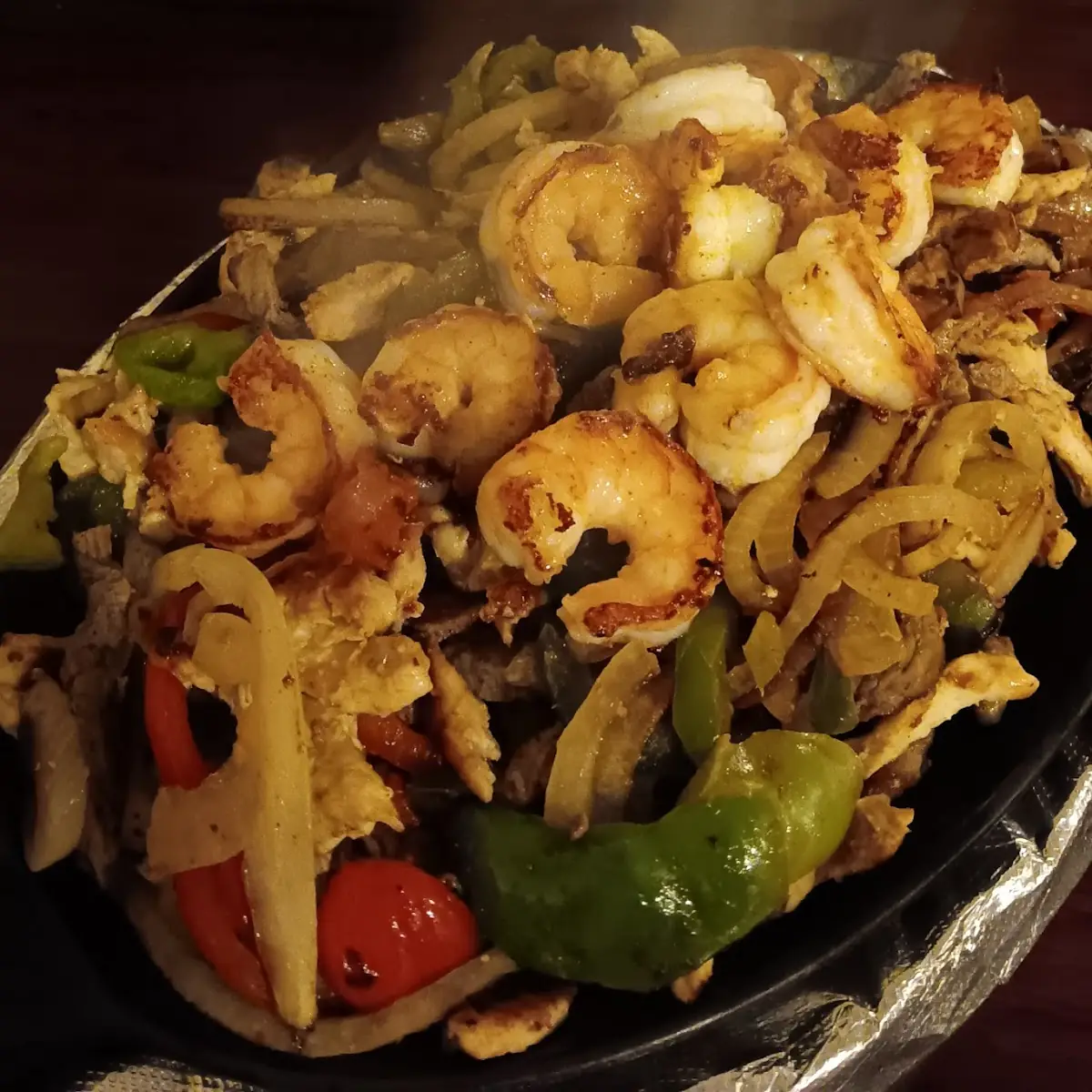 Chicken Beef and Shrimp Fajitas