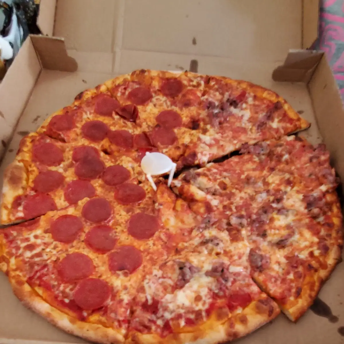 Half Pepperoni Half Sausage Pizza
