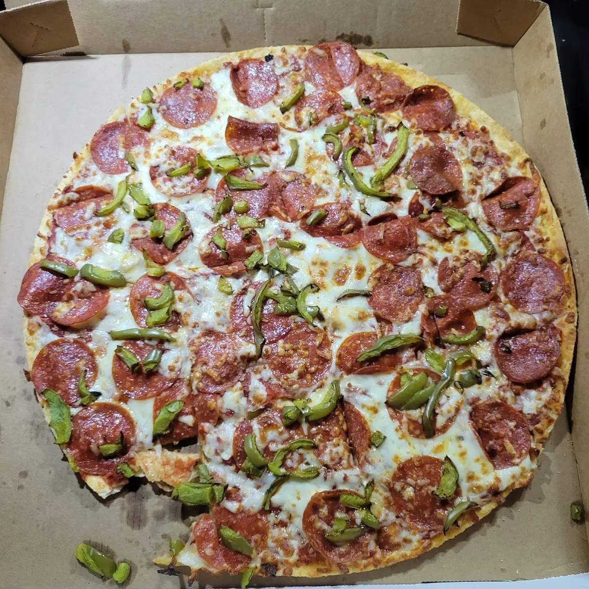 Pepperoniand Green Peppers on Thin Crust