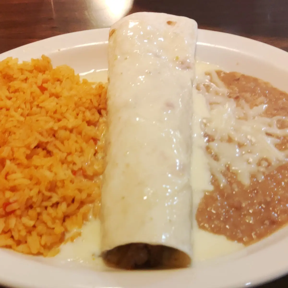 Beef Lunch Burrito with Refried Beans and Mexican Rice