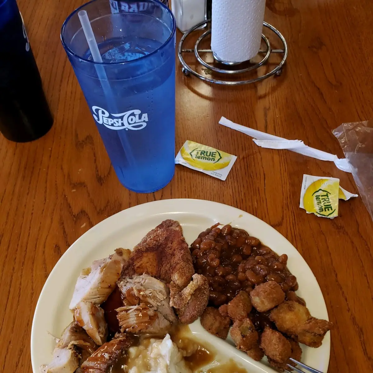 Pulled Pork Plate with Fried Okra Mashed Potatoes and Gravy and BBQ Style Baked Beans