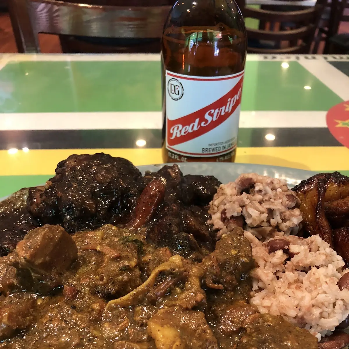 Oxtails & Curry Goat Combo