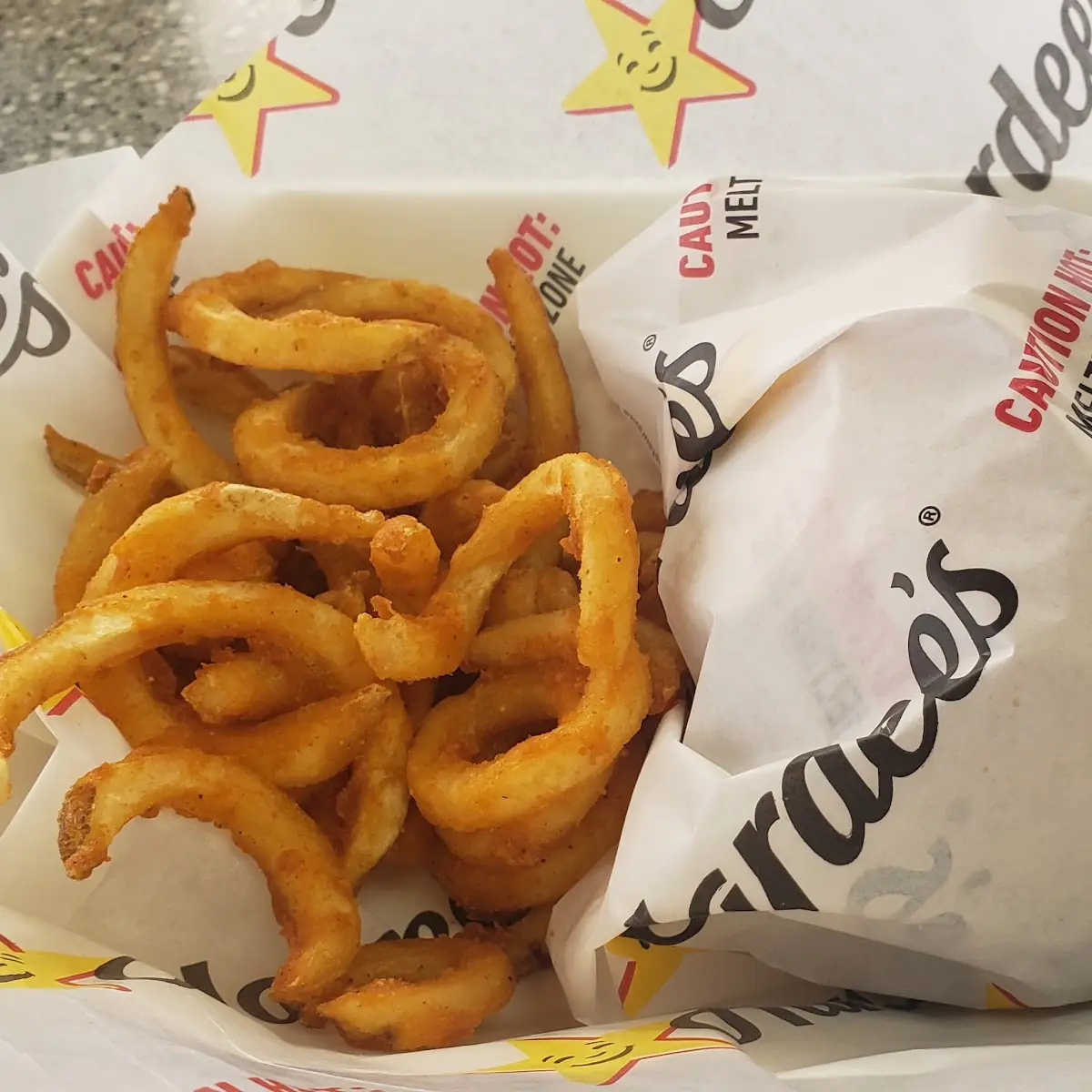 Regular Cheeseburgerand Curly Fries
