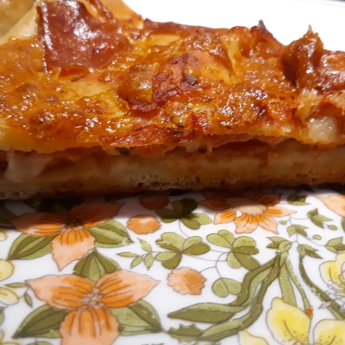 Slice of Stuffed Pepperoni Pizza