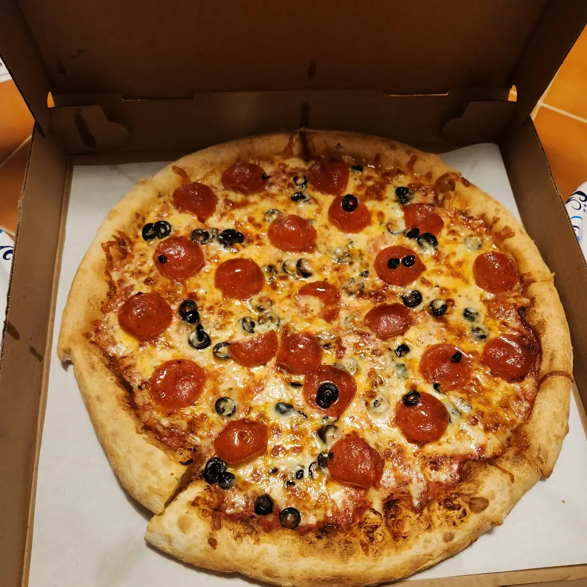 Pepperoni and Black Olive Pizza