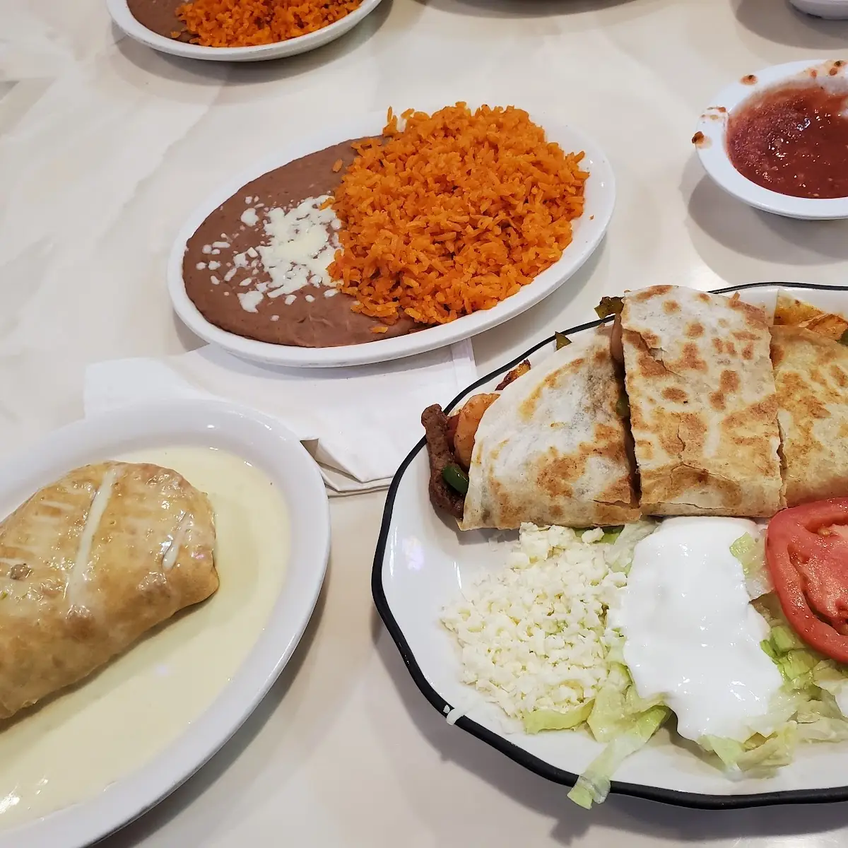 Beef Flautas with Rice and Refried Beans
