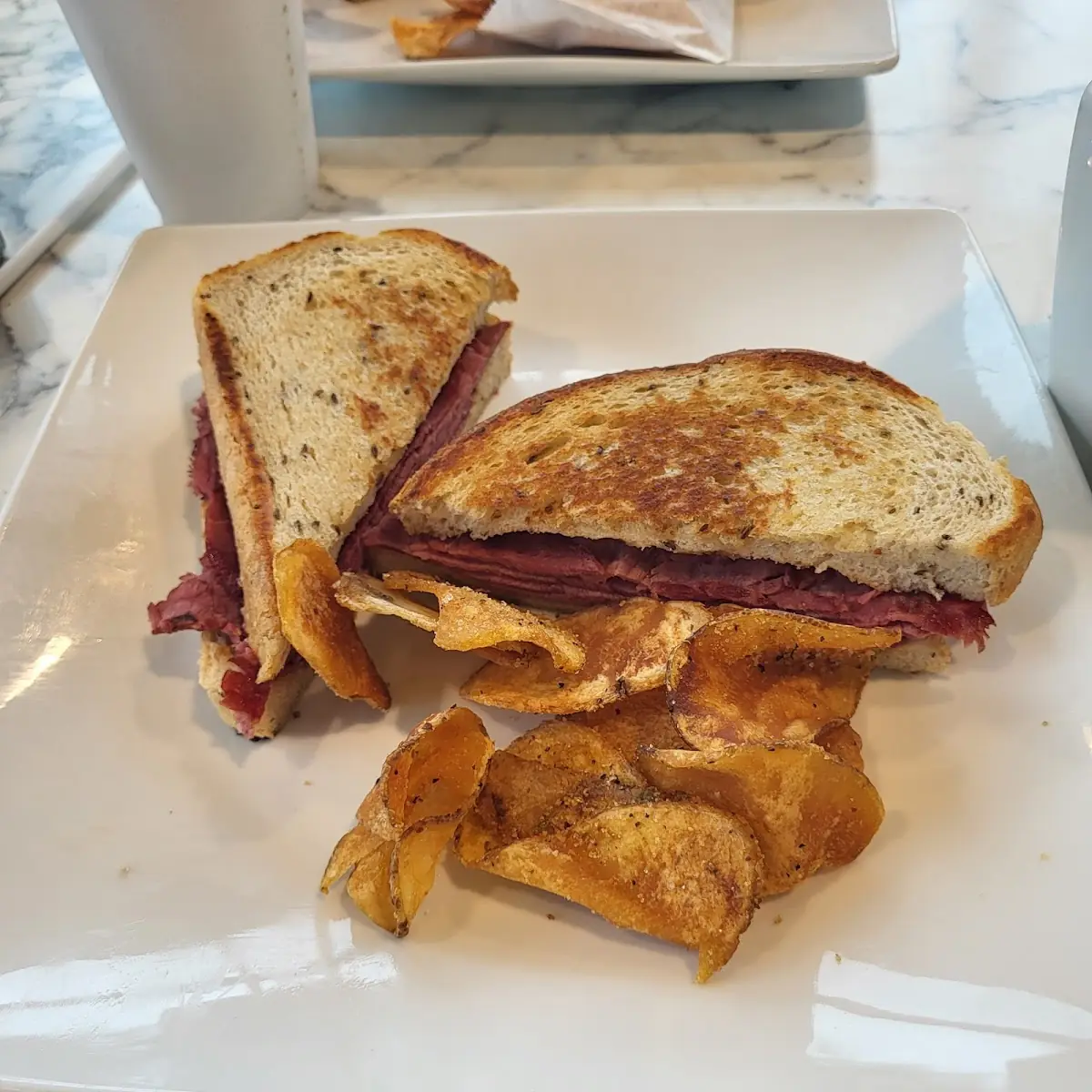 Corned Beef Sandwich and Chips