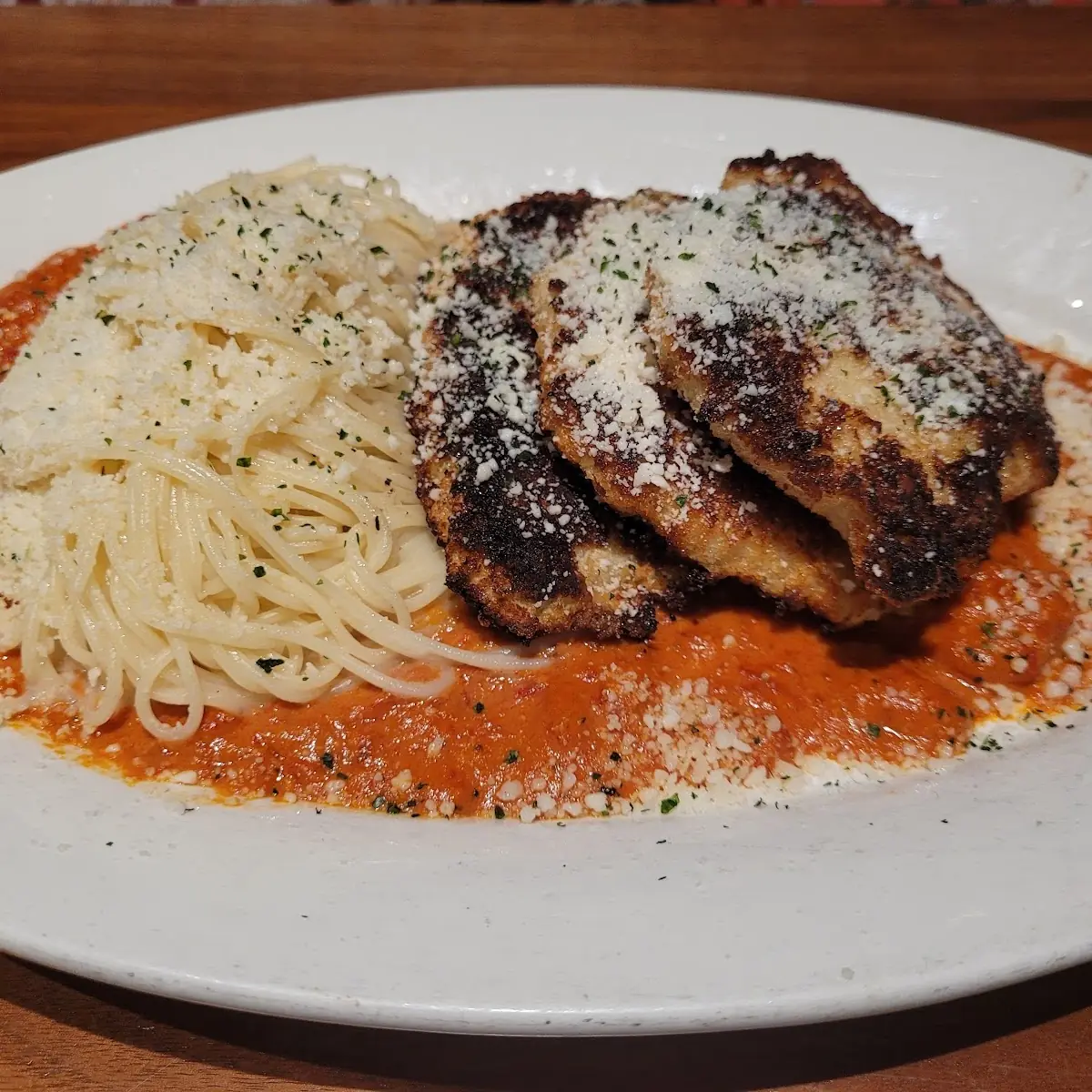 Romano Crusted Chicken Parmigiana with Spaghetti