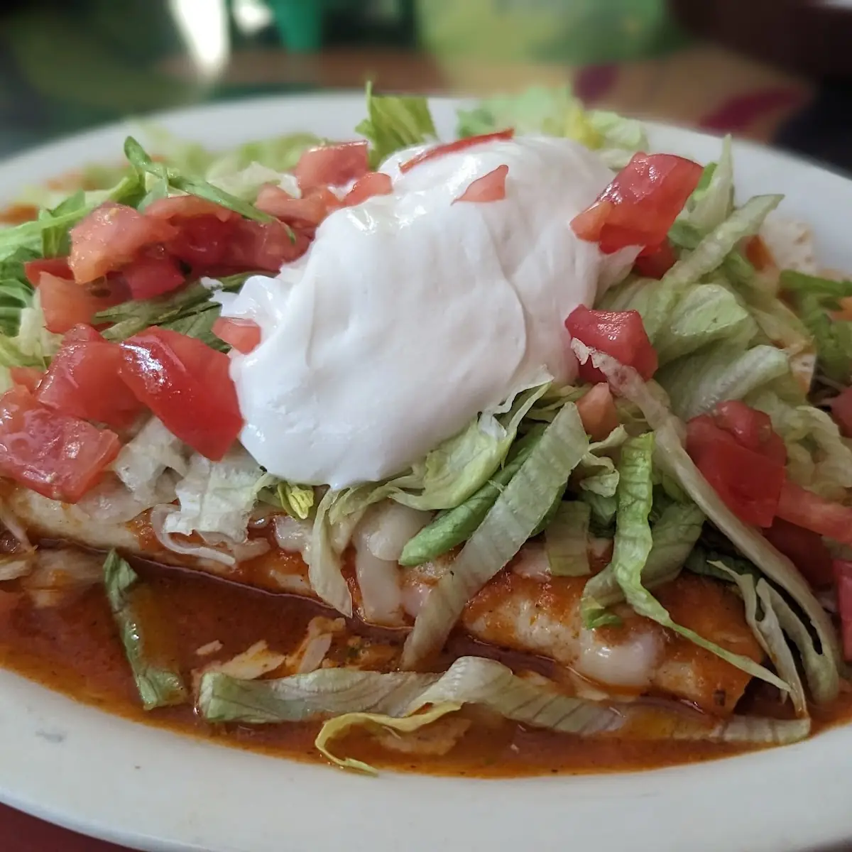 One Enchilada One Taco and One Beef Tostada With