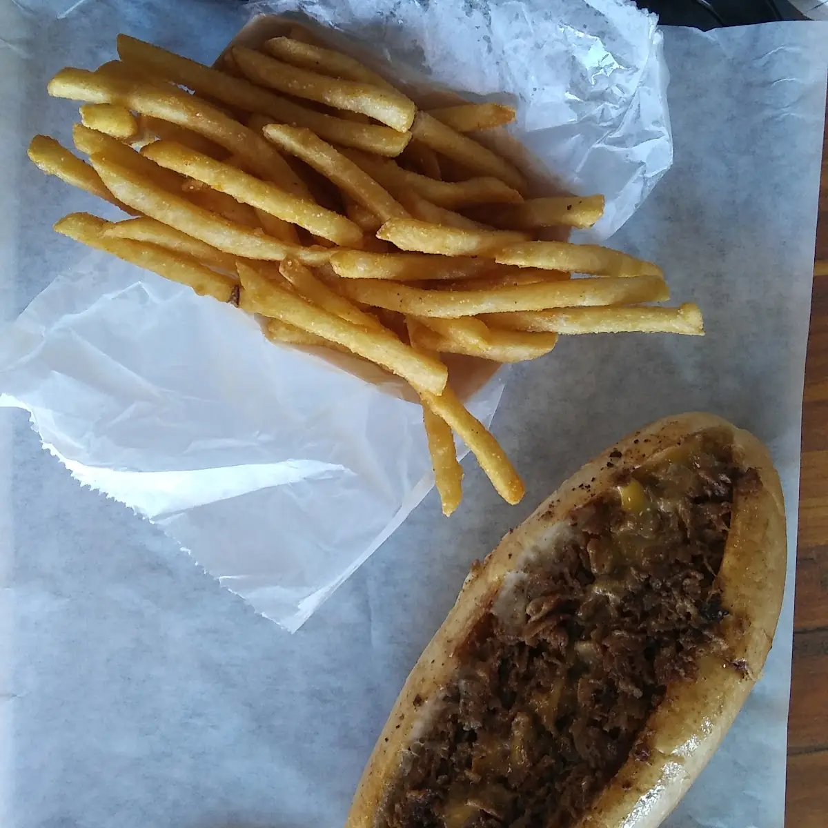 Philly Cheese Steak Sandwich and Fries
