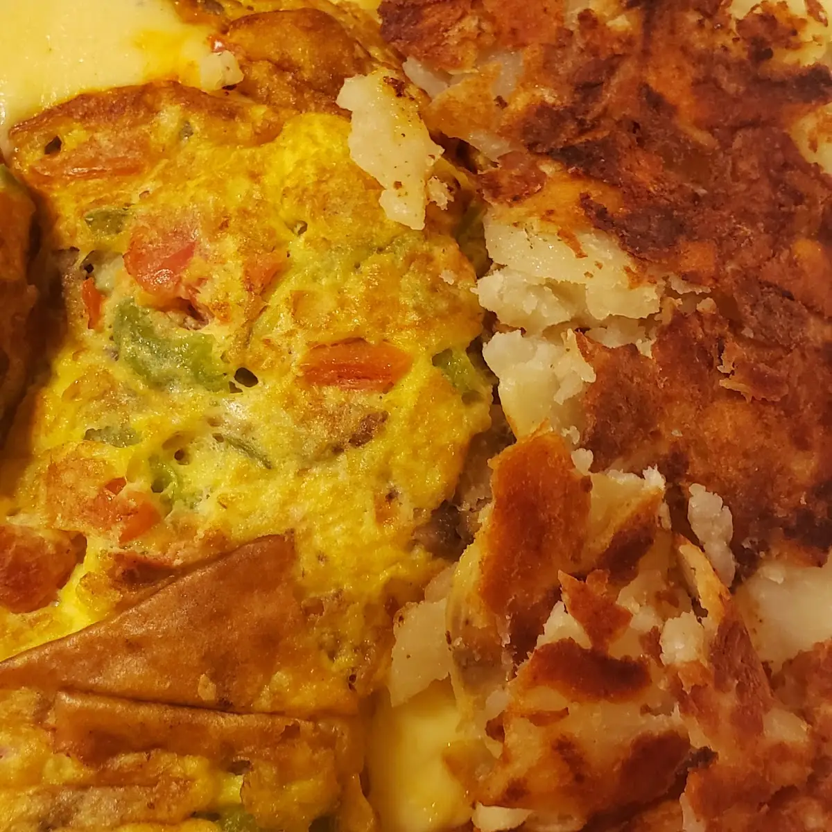 Burnt Hash Browns & Omelette