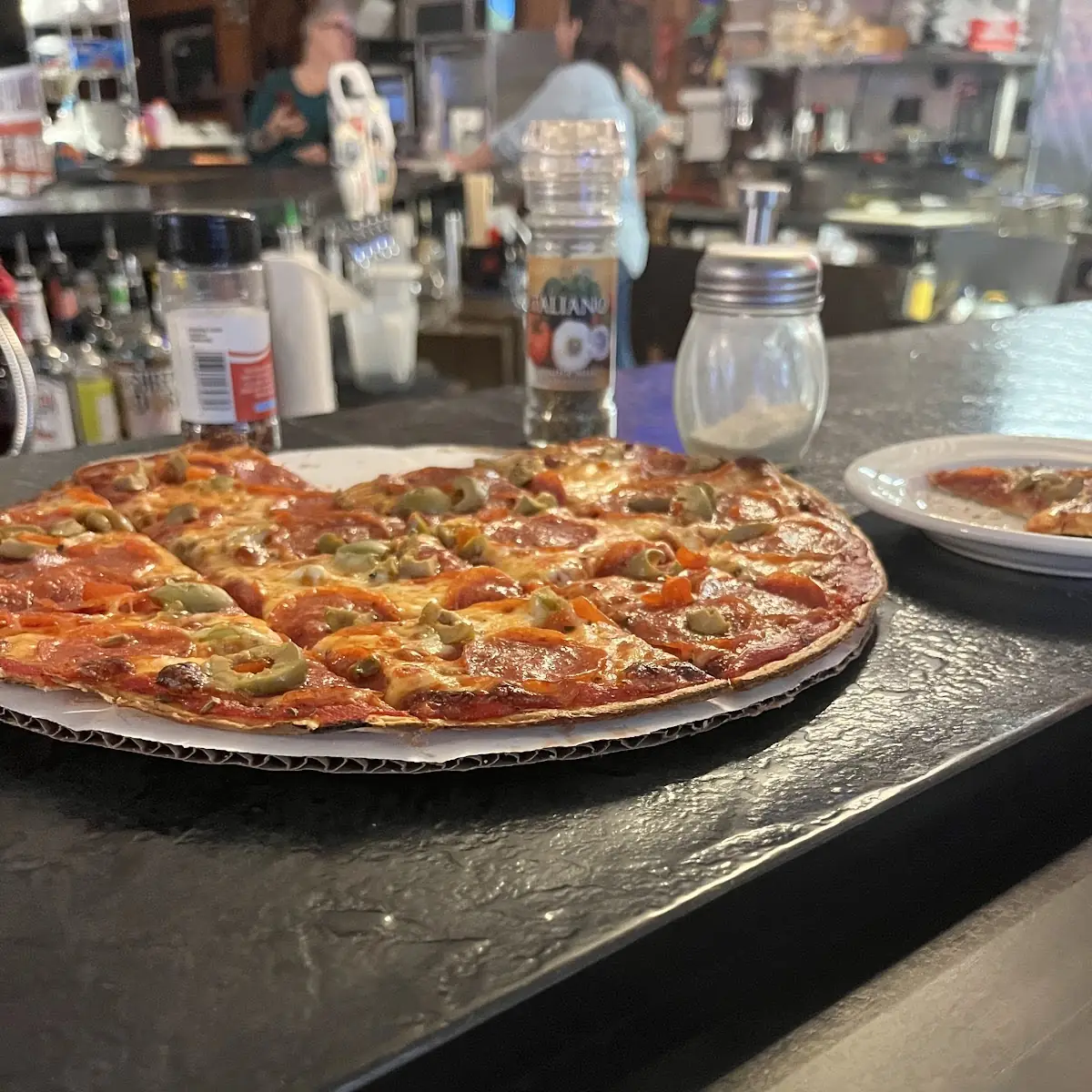 Pepperoni and Green Olive Pizza