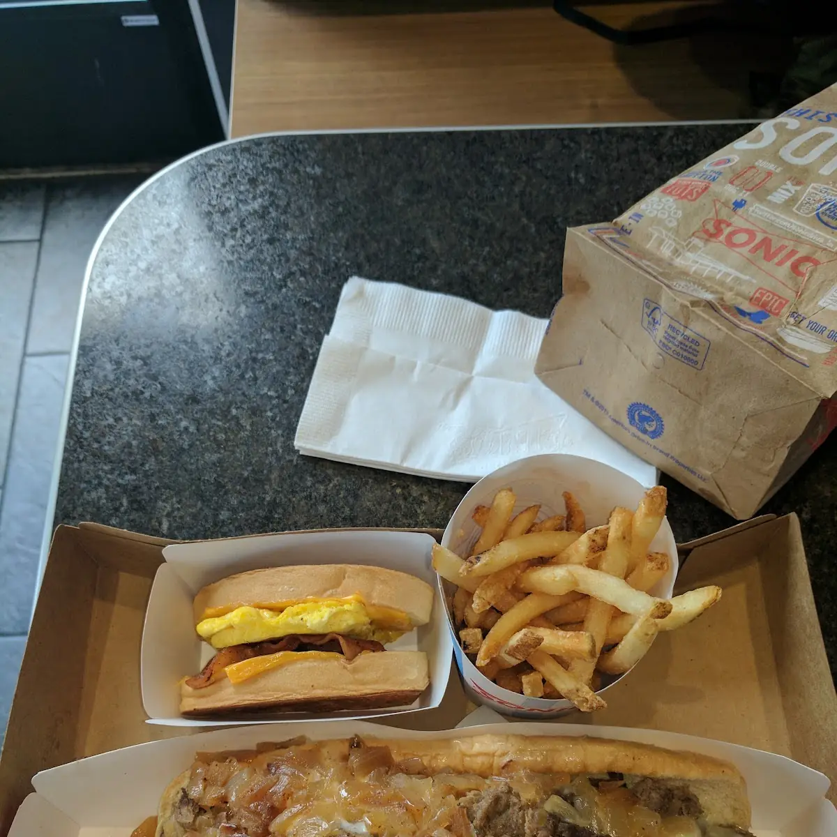 Steak and Cheese Bacon Egg Breakfast Sandwich