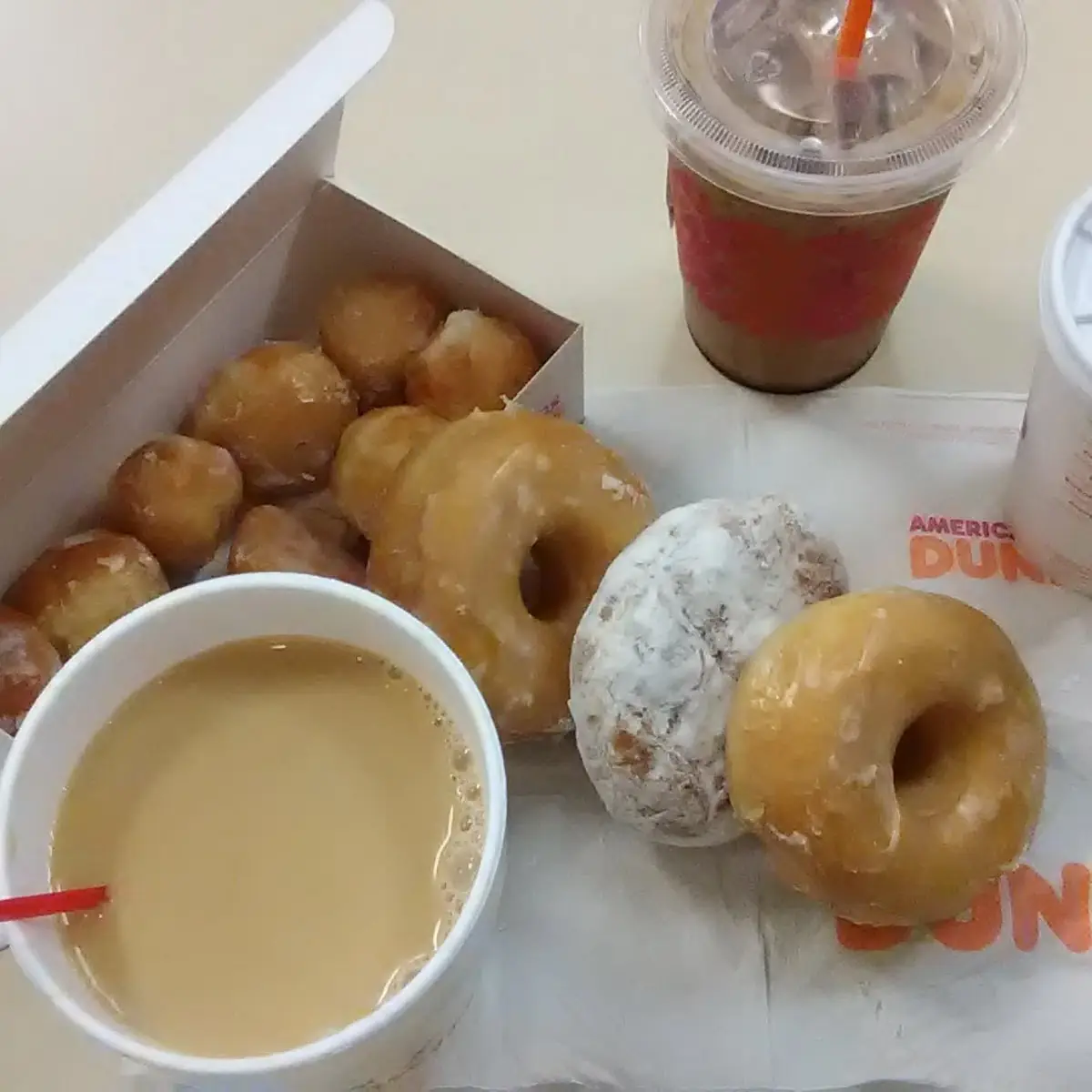 Two Regular Donuts and One Vanilla Creme Donut