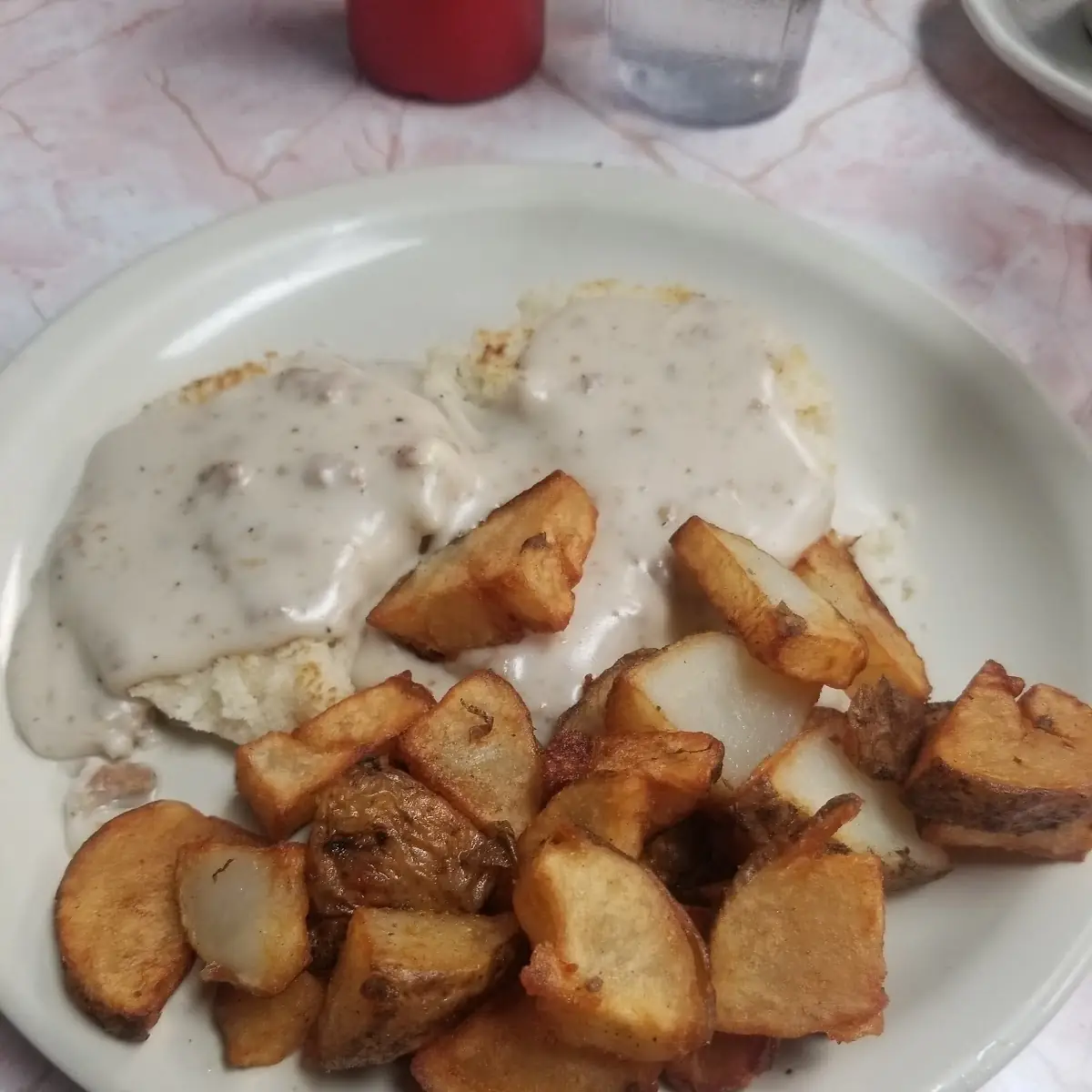 Sausage Gravy over Biscuits and Deep Fried Hash Browns