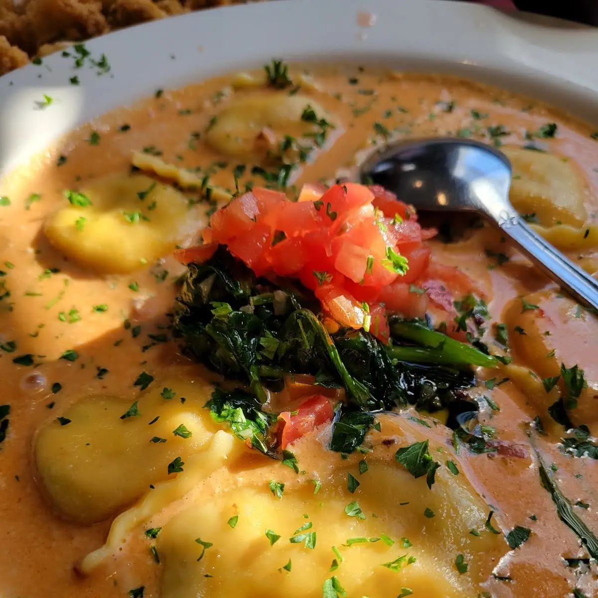 Lobster Ravioli in Wine Sauteed Spinach