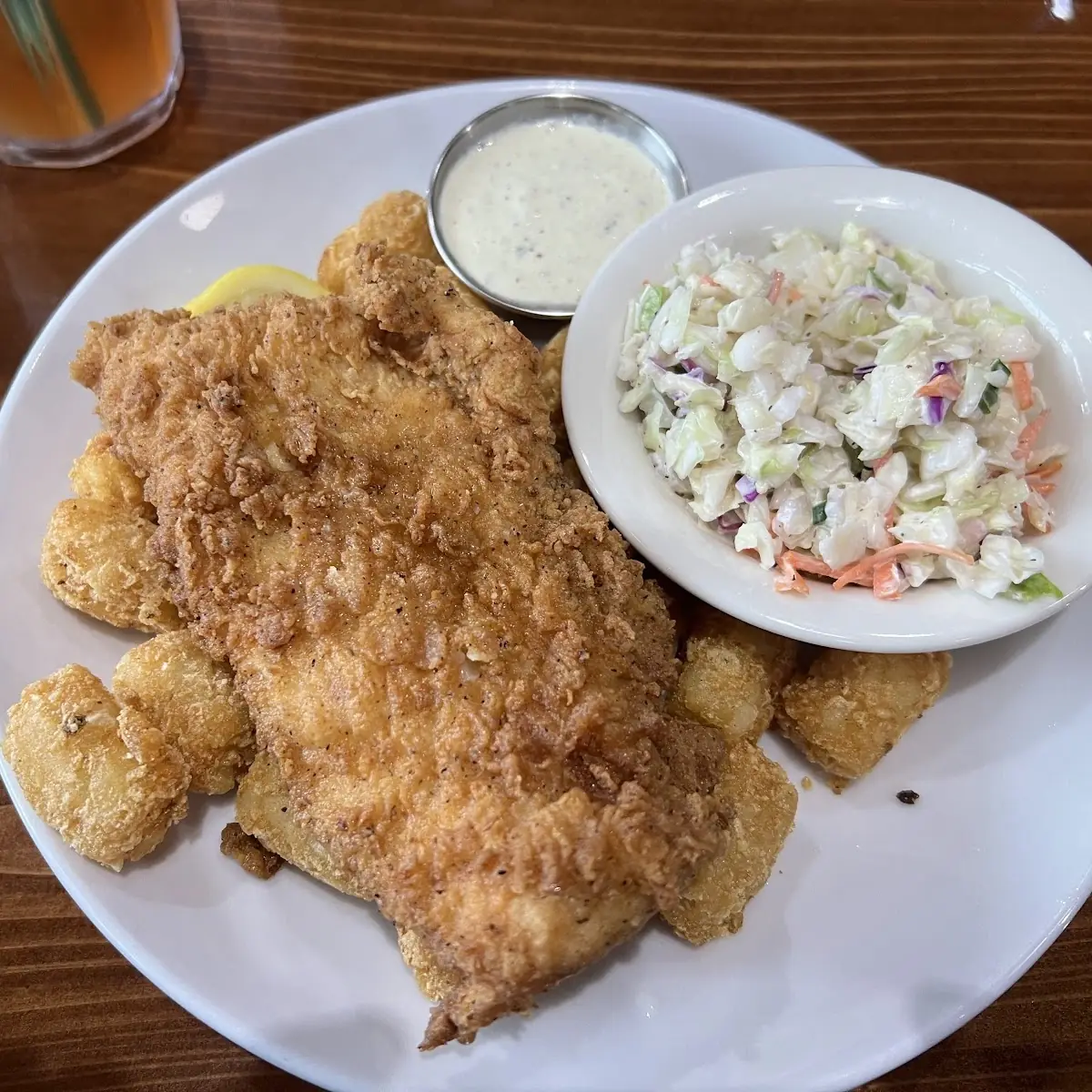 Fried Fish Served with Tots and Slaw