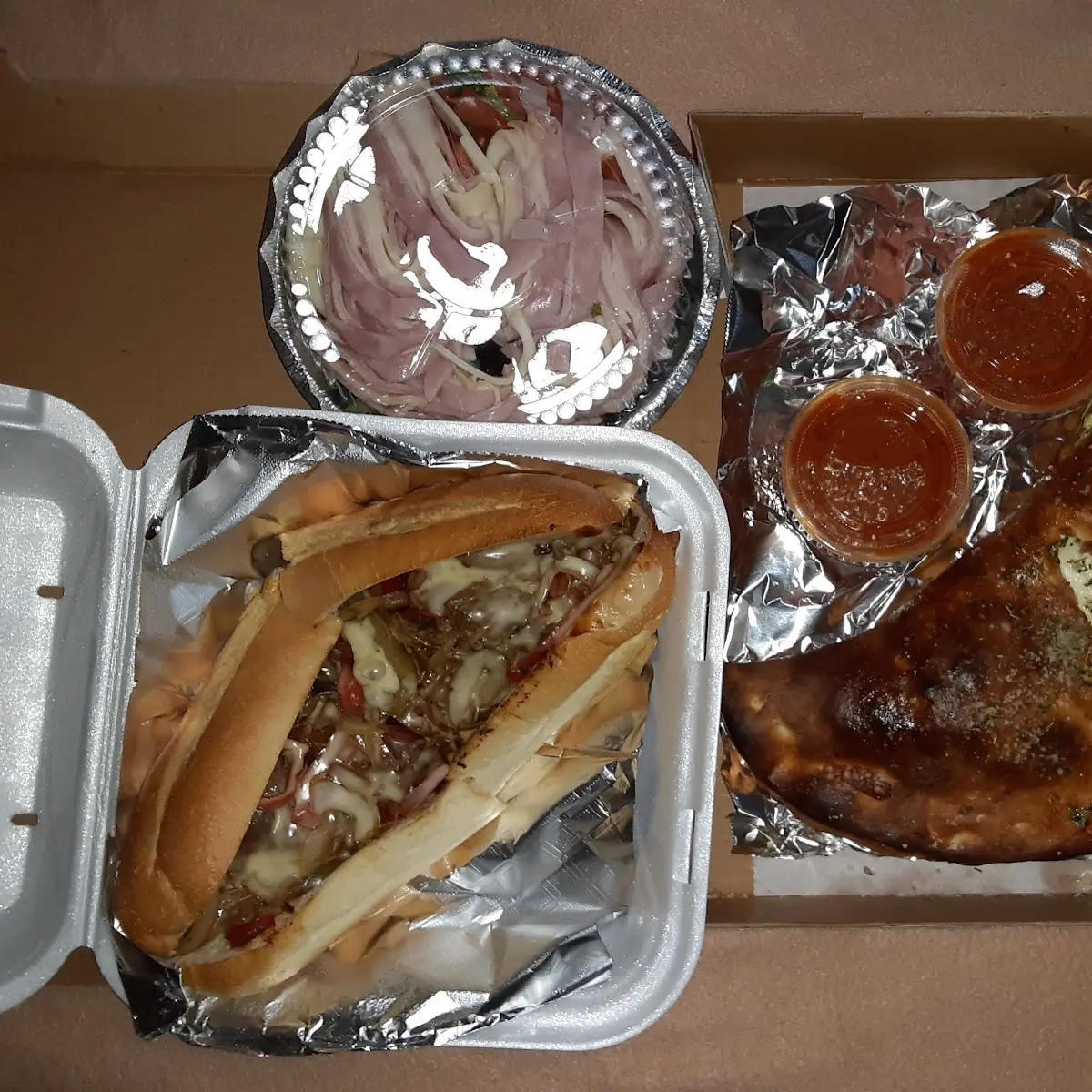 Philly Cheese Steak and Ham and Cheese Calzone