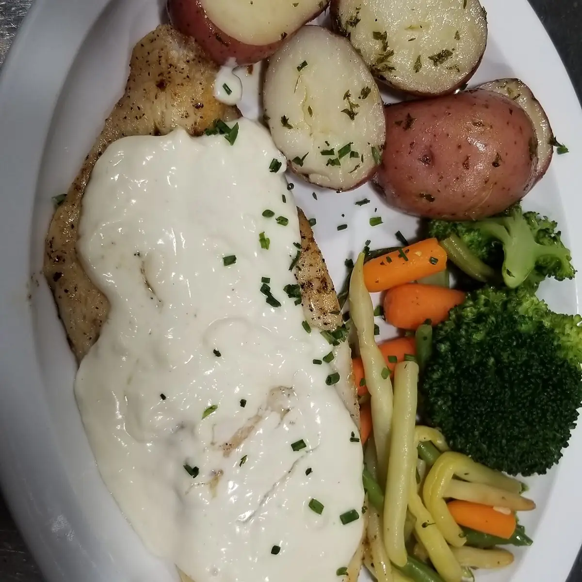 Orange Roughy with Roasted Red Potato with Mixed Vegetables
