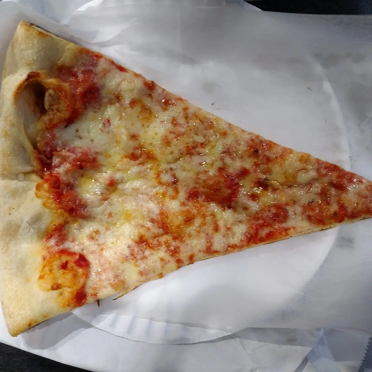 Pizza Slice with a Little Extra Cheese