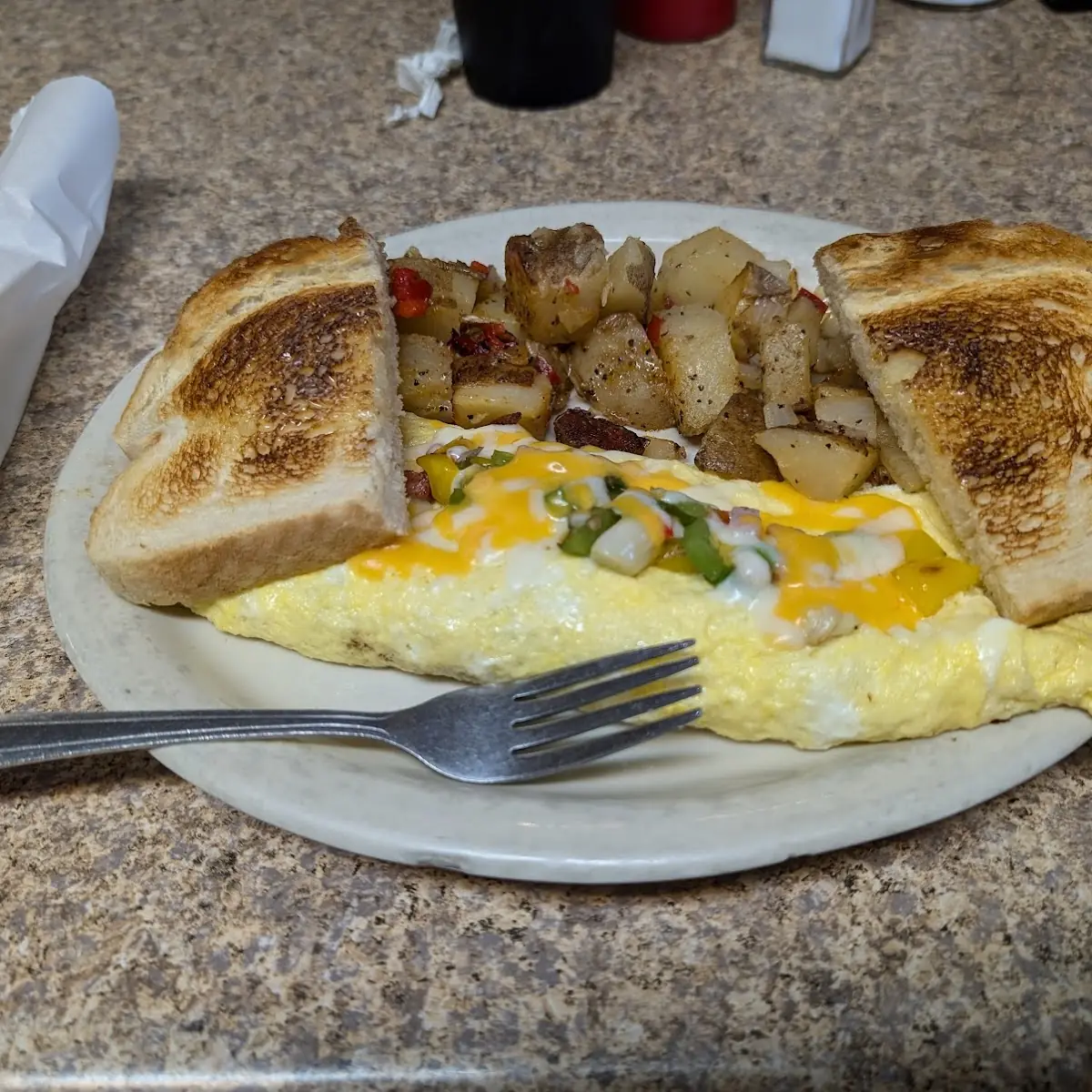 Cheese Omelet with Toast and Hash Browns