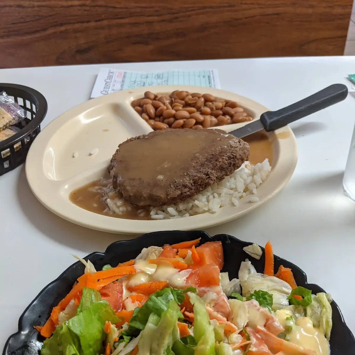 Hamburger Steak over Rice and Beans