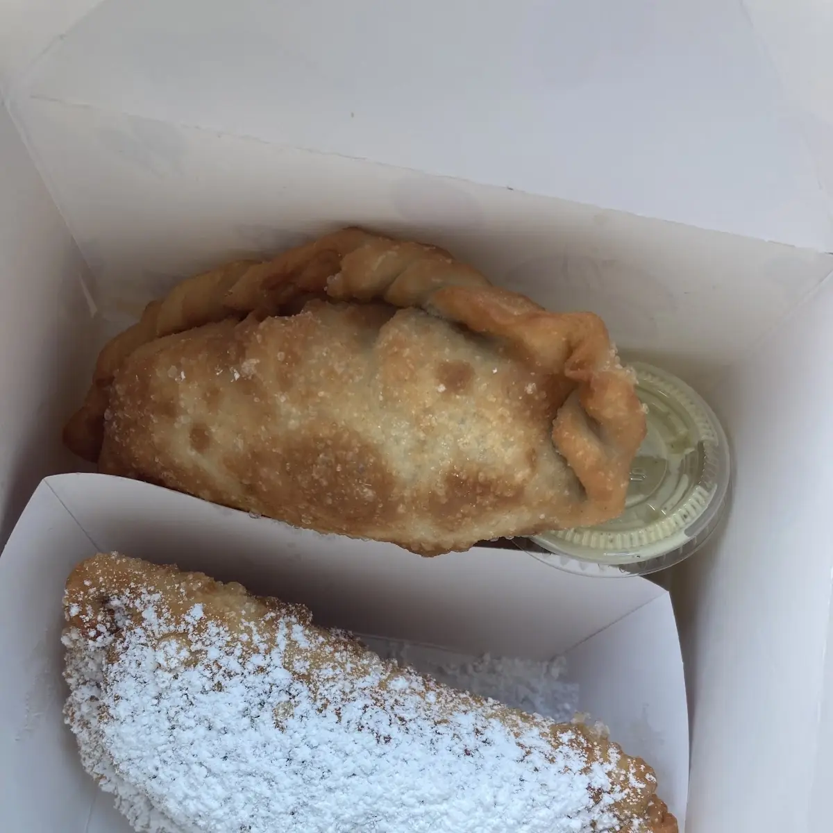 Cheese Empanada and Plantain & Sausage Empanada