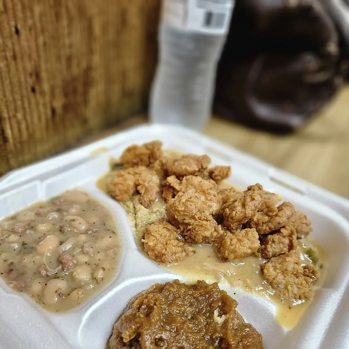 Crawfish Etouffee Supreme Etouffee over Cornbread Dressing with Choice of Fried Shrimp or Fish