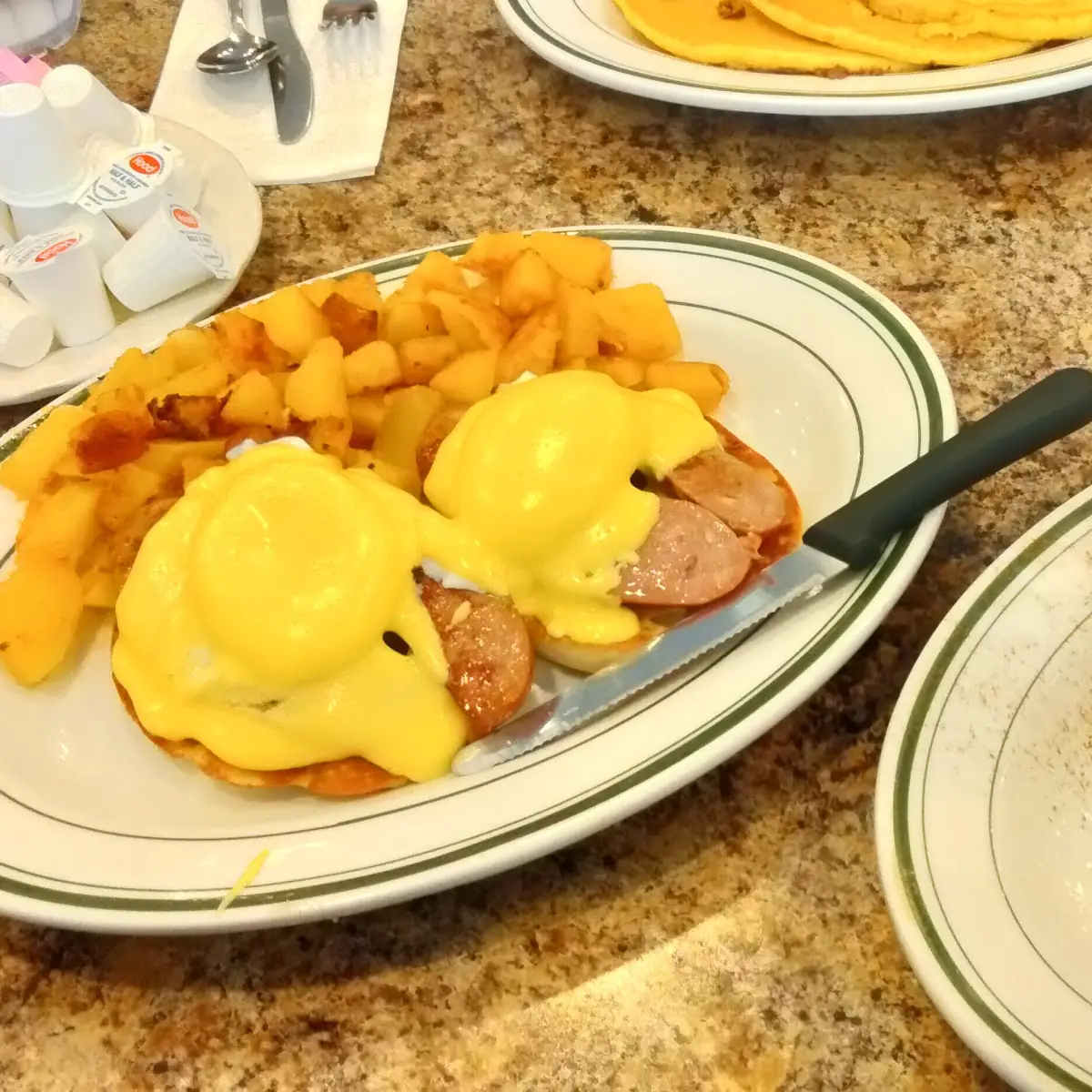Eggs Benedict with Apple Cinnamon Roll French Toast