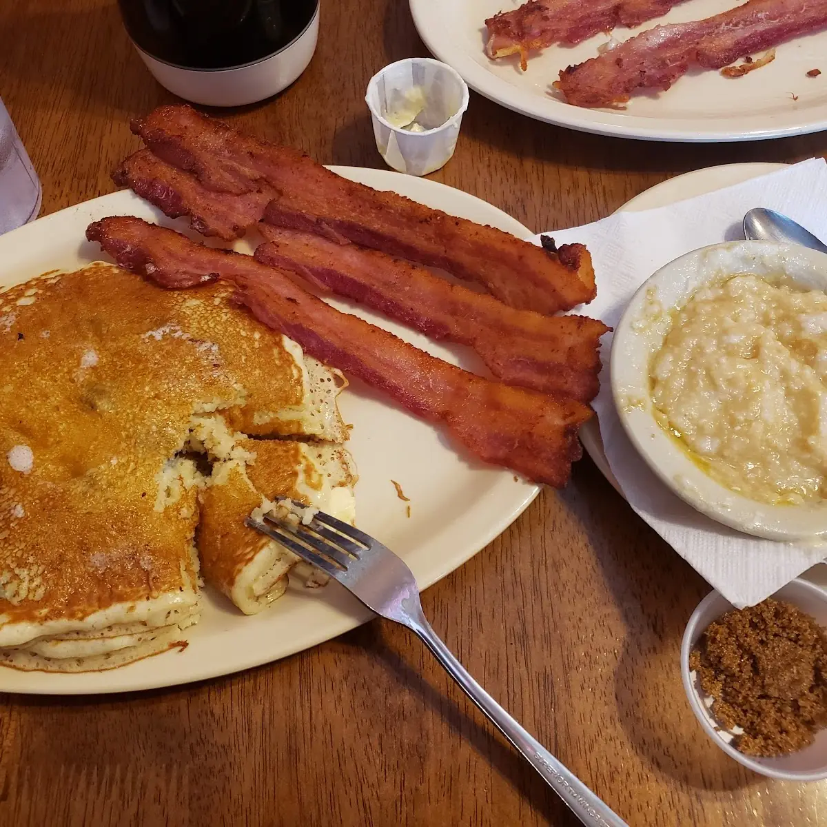 Blueberry Pancakeswith Crispy Bacon and Grits