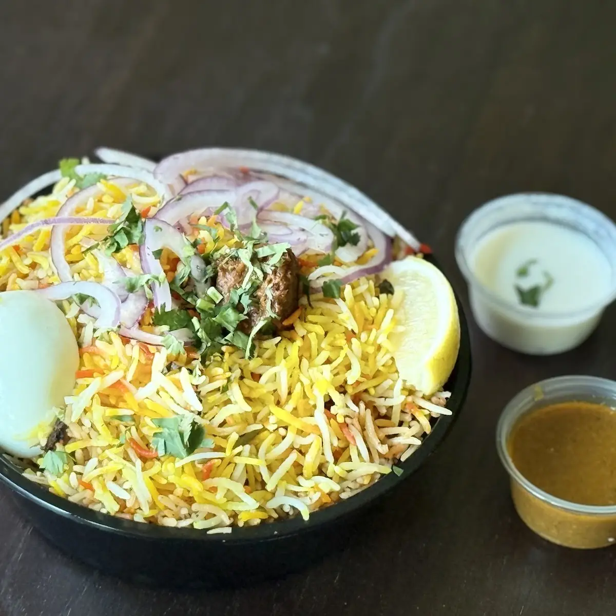 Chicken Biryani with Lemon Wedge