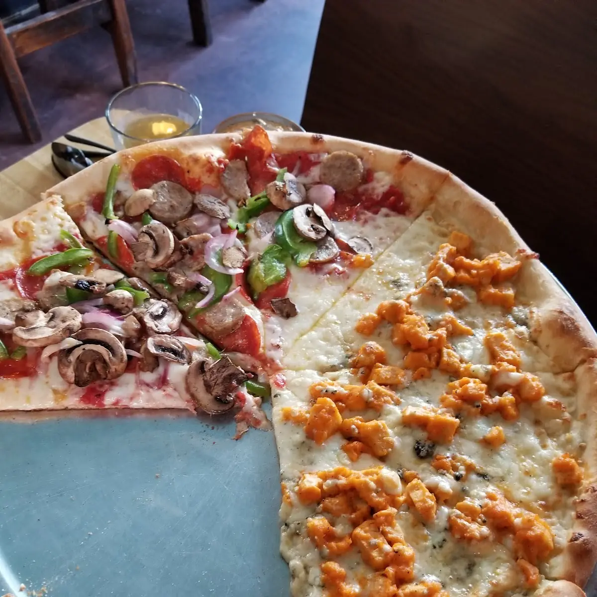 Supreme Pizza and Buffalo Chicken Pizza