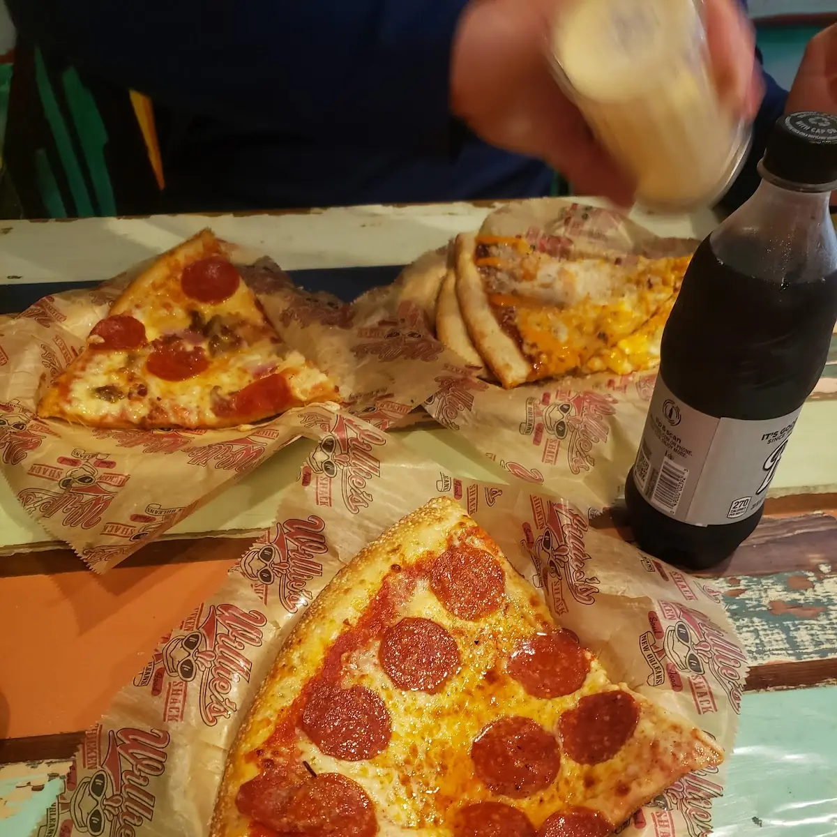 Alligator Sausage Pizza Slice