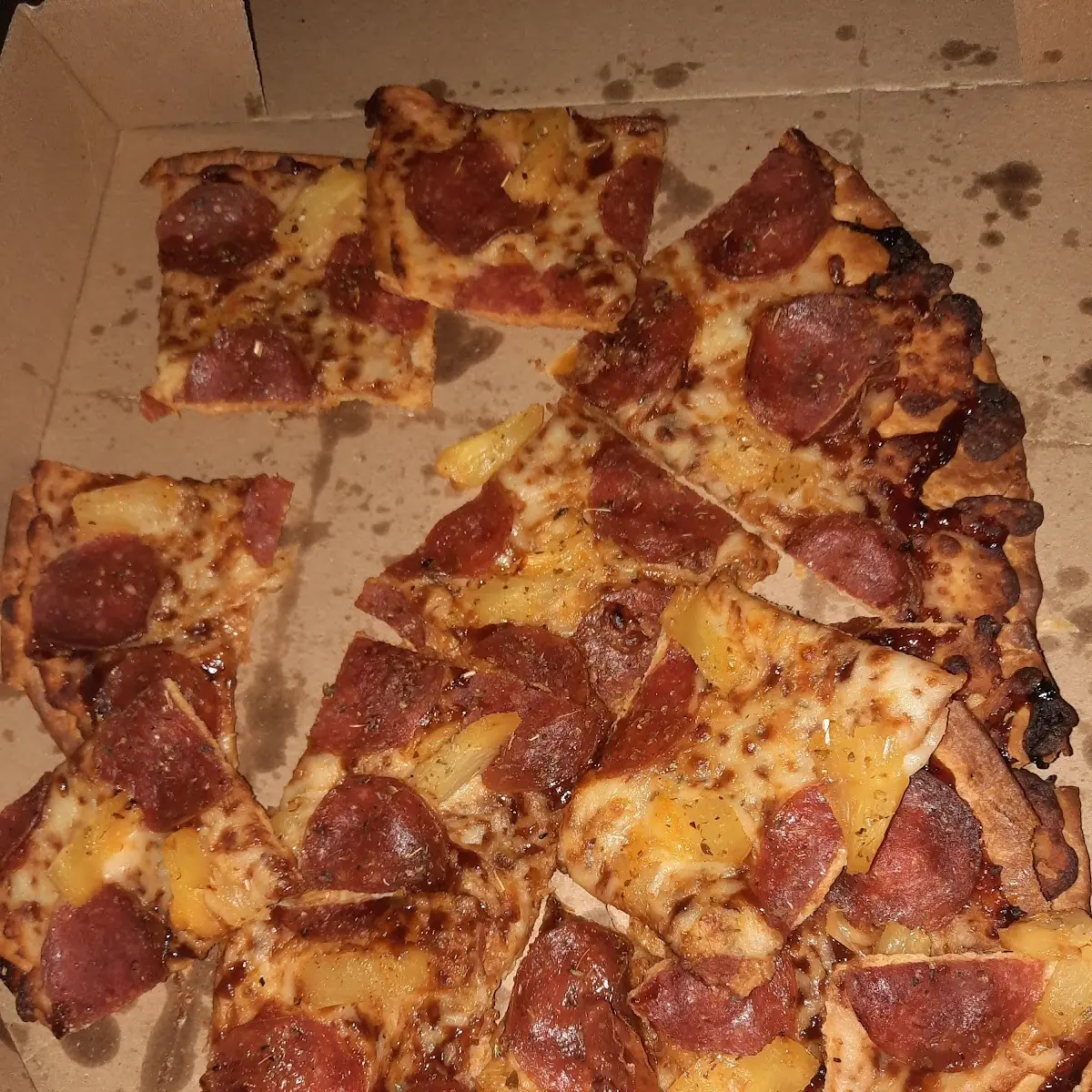 Thin Crust Pepperoni Pizza with Pineapples