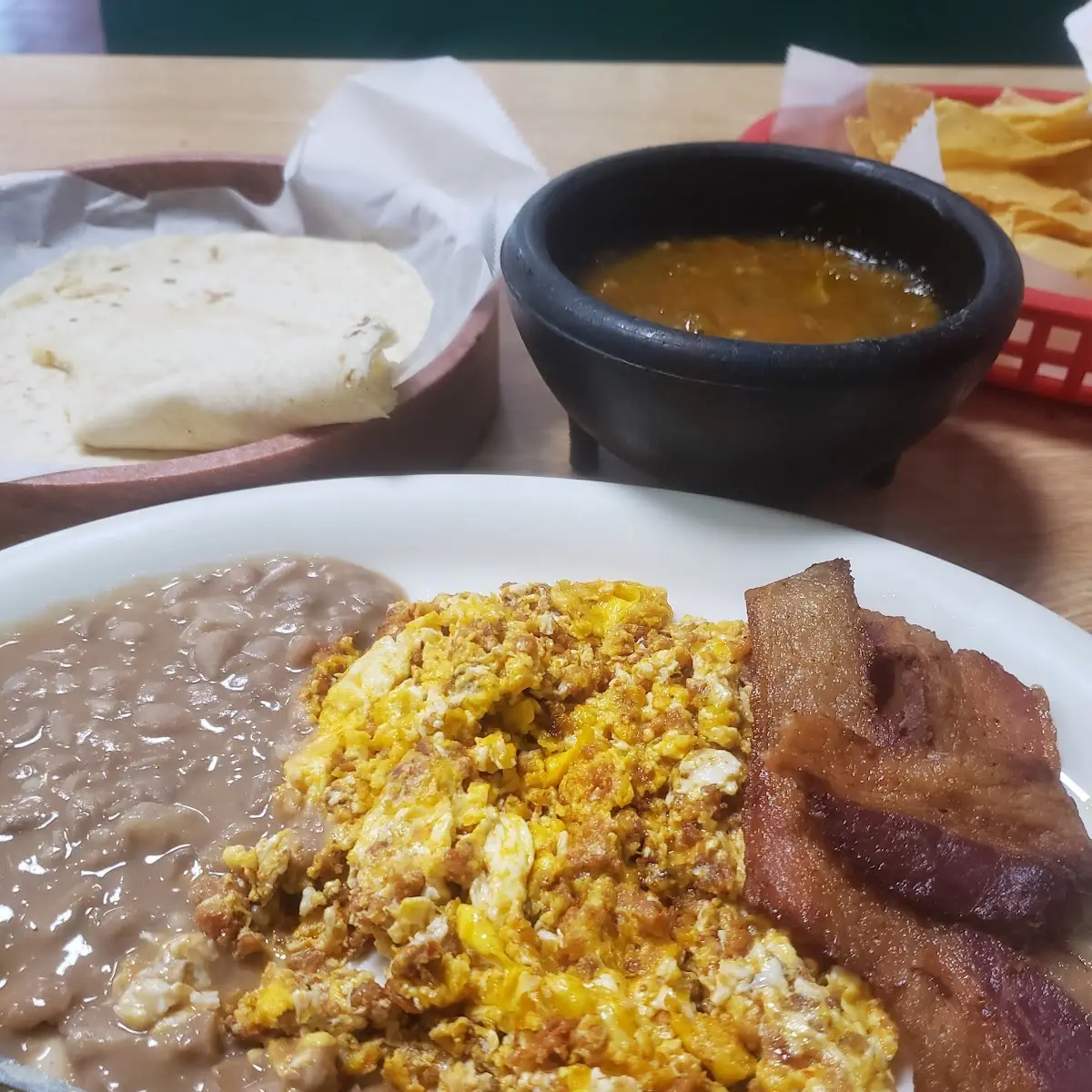 Scrambled Eggs with Potatoes and Refried Beans