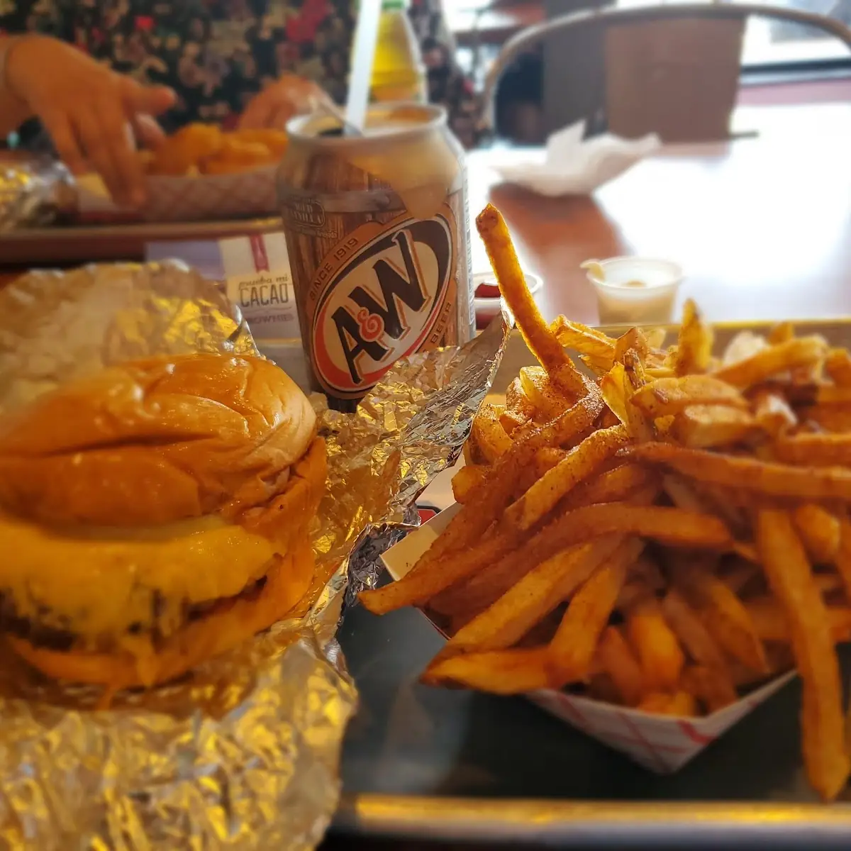 Bacon Burger with Cheese and Cajun Fries